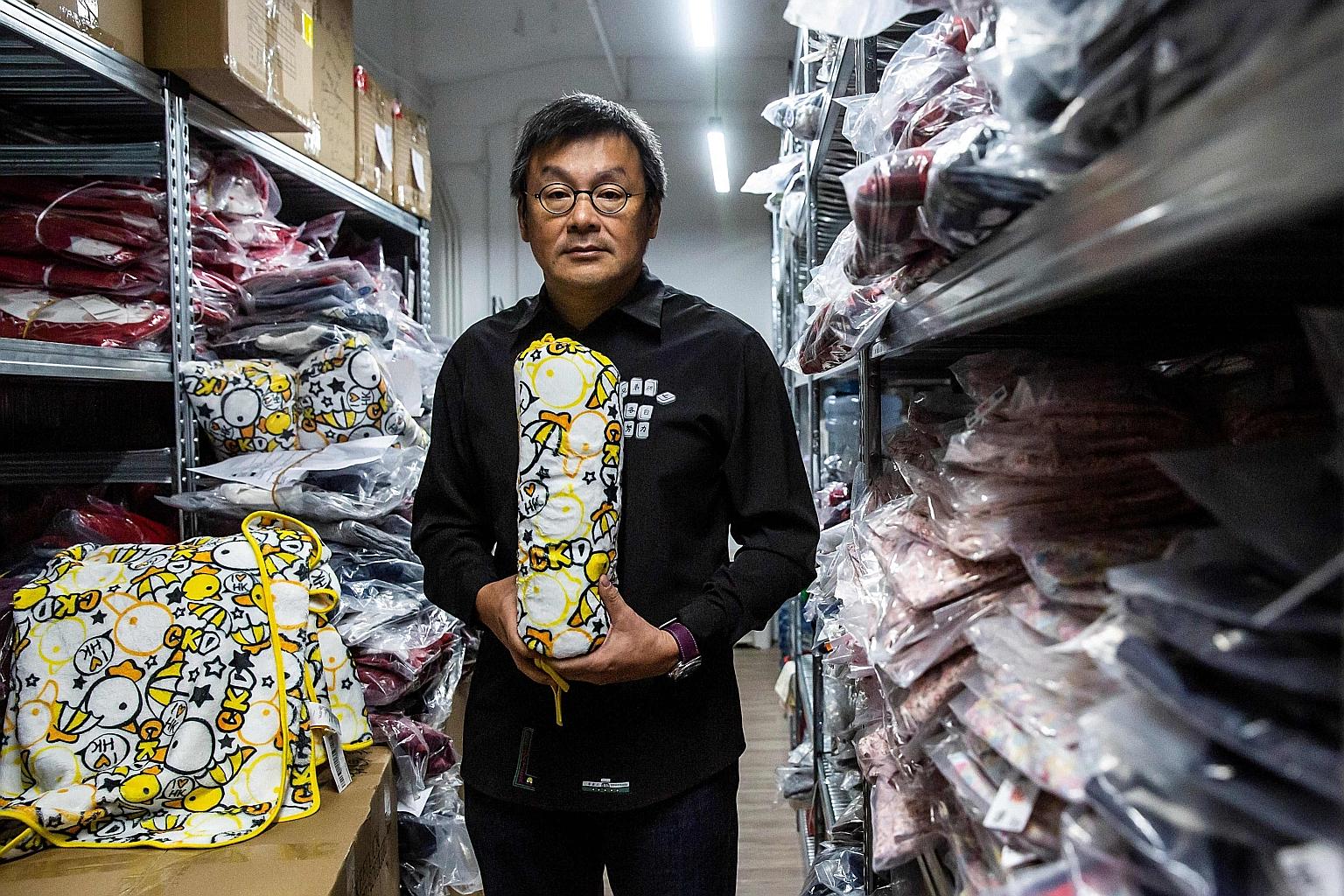 Chickeeduck owner Herbert Chow is now struggling to get his designs made in China, where products featuring his avian characters have been seized by the authorities for "advocating violence". PHOTO: AGENCE FRANCE-PRESSE