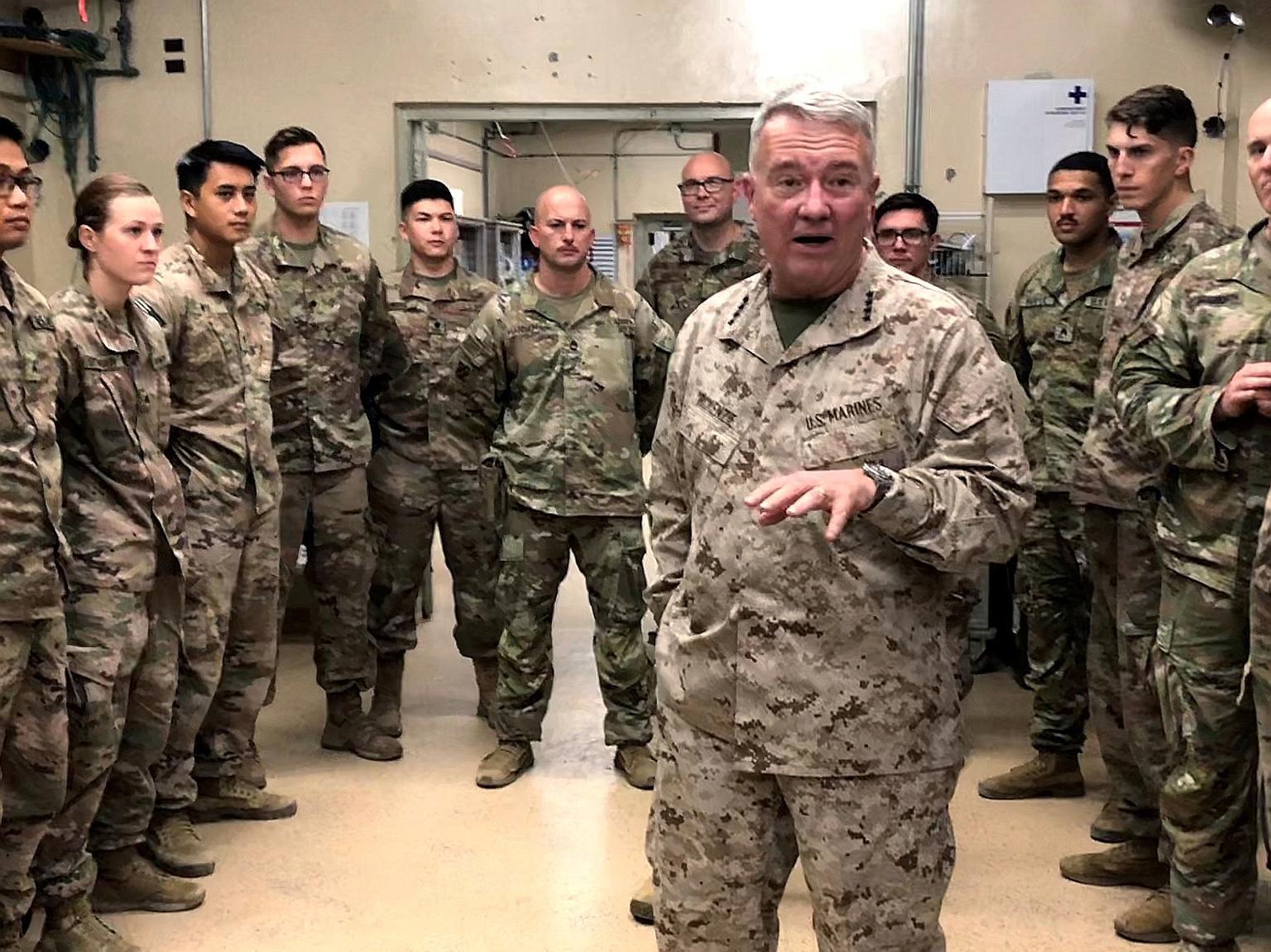 Marine General Kenneth McKenzie, head of the United States Central Command, speaking to US troops while visiting Forward Operating Base Fenty in the Afghan city of Jalalabad in September 2019. American troop numbers in Afghanistan peaked at more than