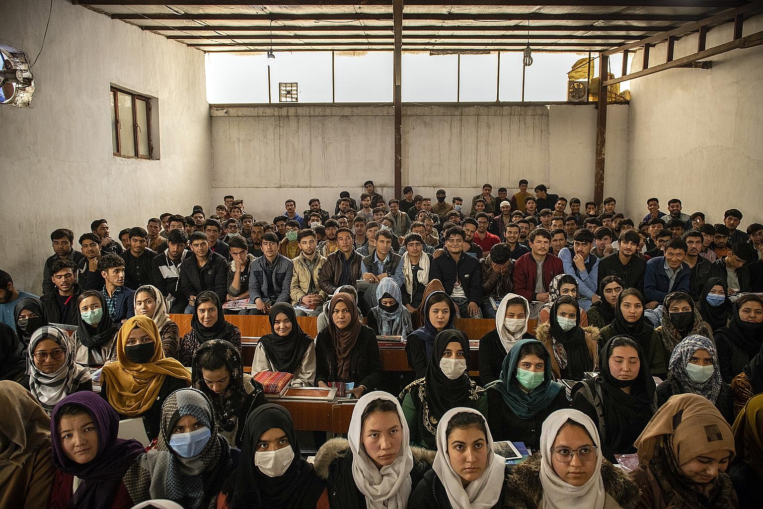 Students at Mawoud Academy in Kabul, Afghanistan, on March 10. The planned US troop withdrawal and the Taleban's likely return to power have raised fears about the future of education for women in the country.