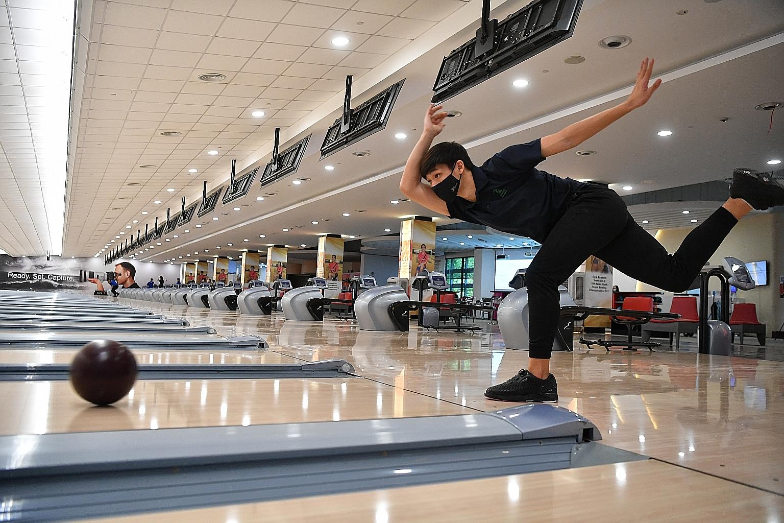 Ryan Toh practising his throw at the National School Games on Wednesday. He won the B Division boys' all-events title yesterday.