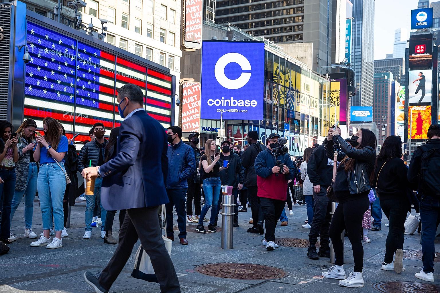 Nasdaq MarketSite in New York on Wednesday, the day Coinbase, a start-up that allows people to buy and sell cryptocurrencies, went public. The listing gives mainstream investors who may be wary of directly buying risky digital currencies the ability 
