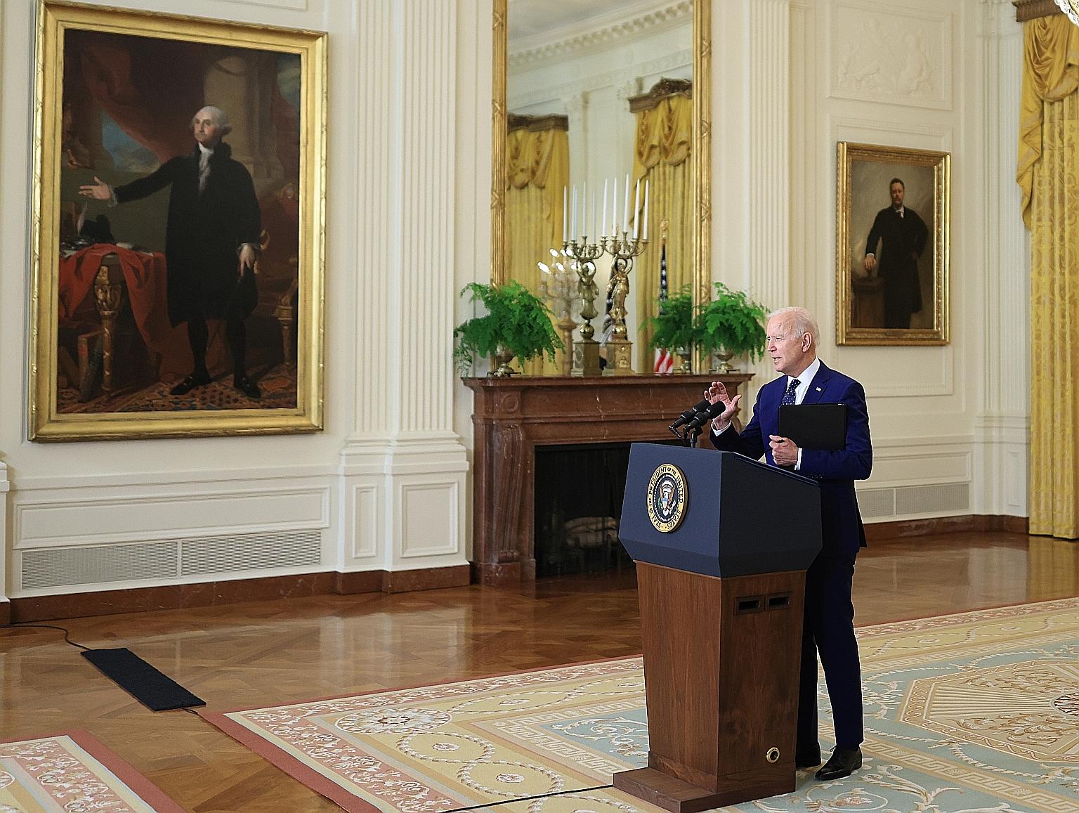 US President Joe Biden, in a speech to the nation on Thursday, said he was fulfilling a vow to punish Russia for misdeeds, but did not want to "kick off a cycle of escalation" that would prevent the two nations from working together. PHOTO: REUTERS