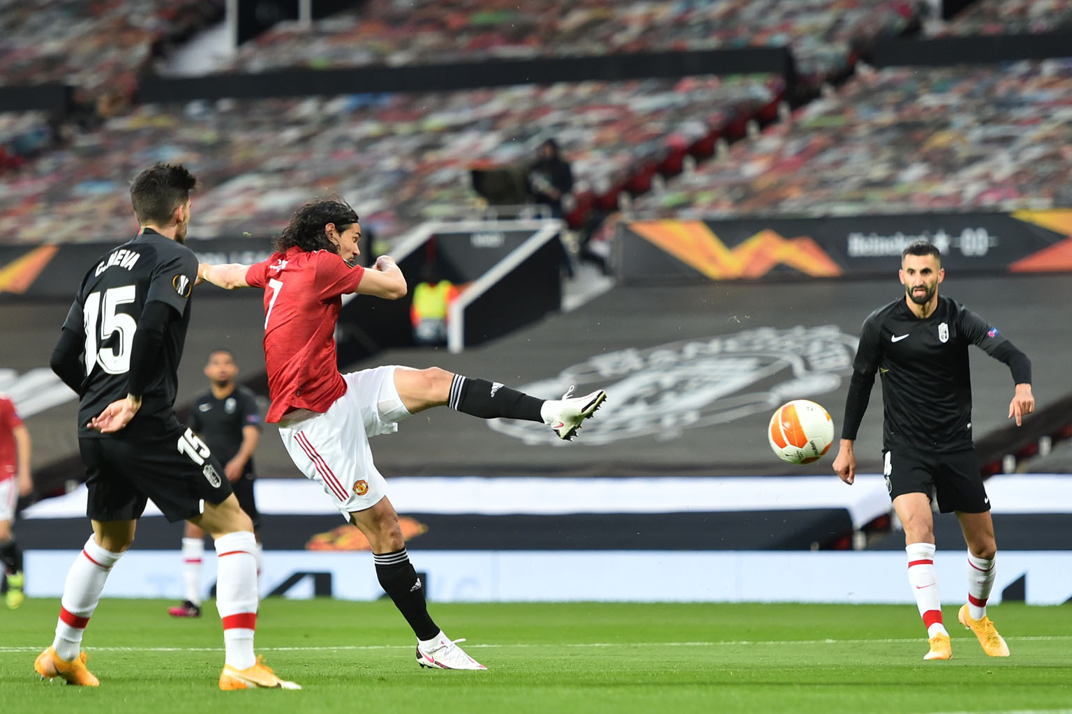 Edinson Cavani scoring to give Manchester United a 1-0 lead during the Europa League quarter-final, second leg against Granada at Old Trafford on Thursday. United completed a 4-0 aggregate win.