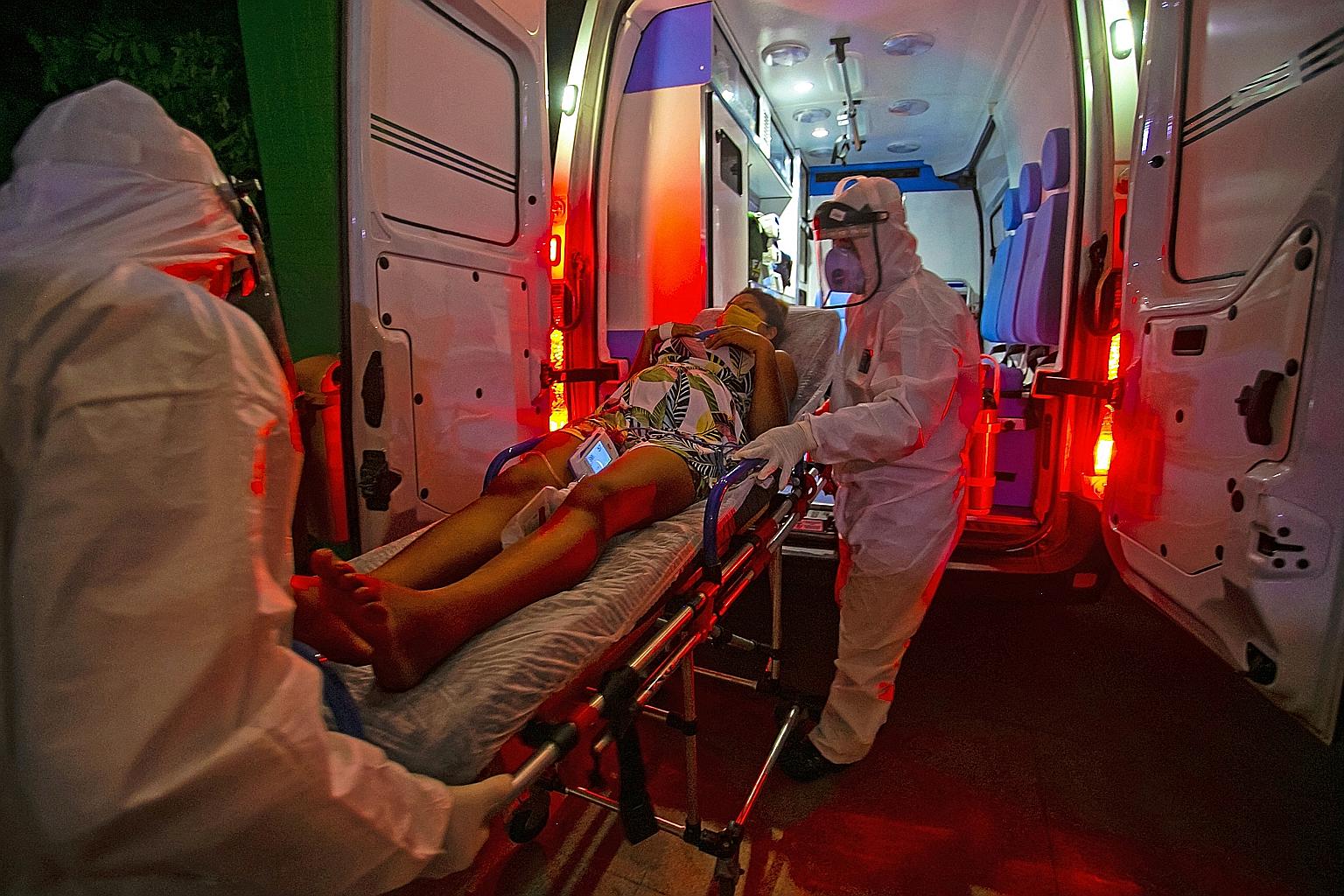A pregnant woman diagnosed with Covid-19 being transported to hospital in Santarem city, Brazil, in July last year. Brazil continues to be one of the epicentres of the pandemic, with more Brazilians dying from the disease each day than anywhere else 