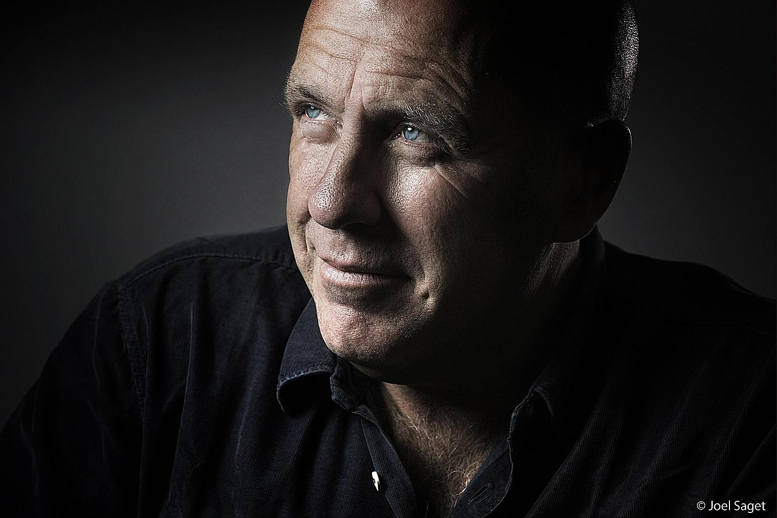 In The Living Sea Of Waking Dreams, Richard Flanagan (left) uses the device of a woman who begins to gradually disappear to depict the world as he sees it - increasingly isolated and on the brink of ecological collapse.