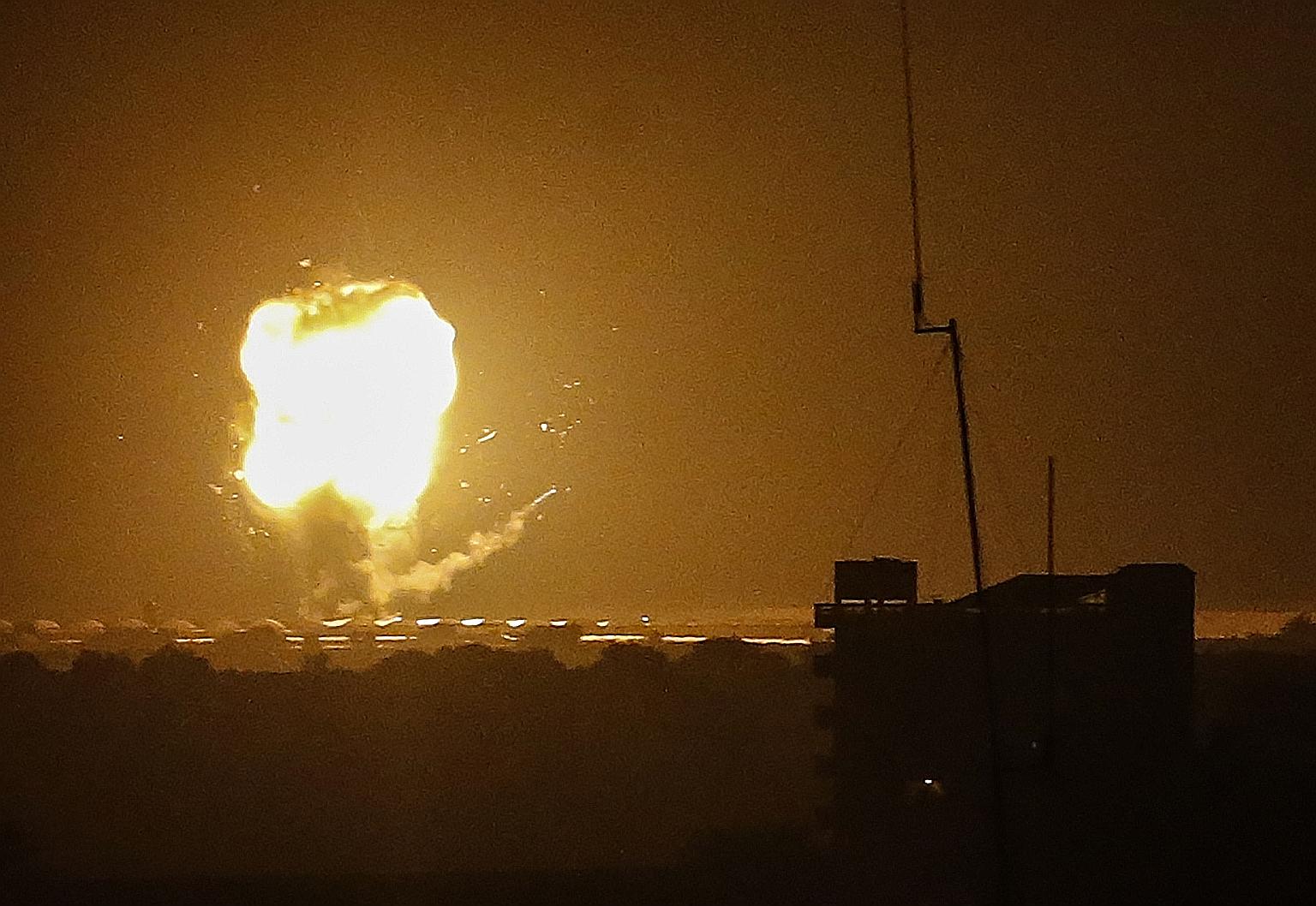 An explosion in Rafah in the Gaza Strip yesterday after an air strike by Israel. A fragile truce has held in recent years despite occasional flare-ups. PHOTO: AGENCE FRANCE-PRESSE