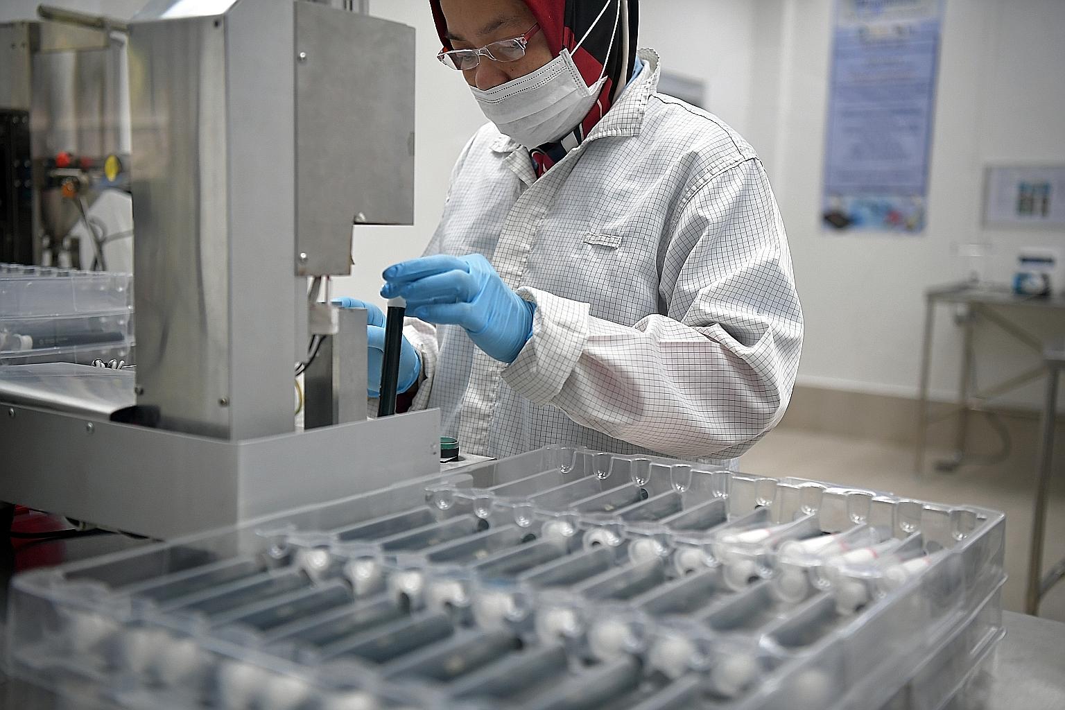 Manufacturing accounts for 21 per cent of Singapore's gross domestic product. The writers say maintaining this high percentage remains critical to the country's vision of a diversified economy that can withstand downturns, as underscored by the Covid