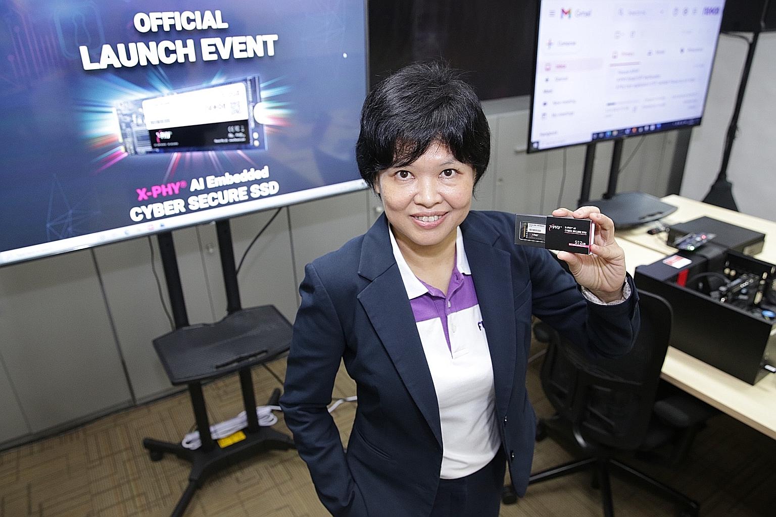 Flexxon chief executive Camellia Chan with her firm's solid state drive. The X-Phy Cyber Secure SSD can also learn new ways in which hackers try to access data to guard against yet-to-be-discovered threats.