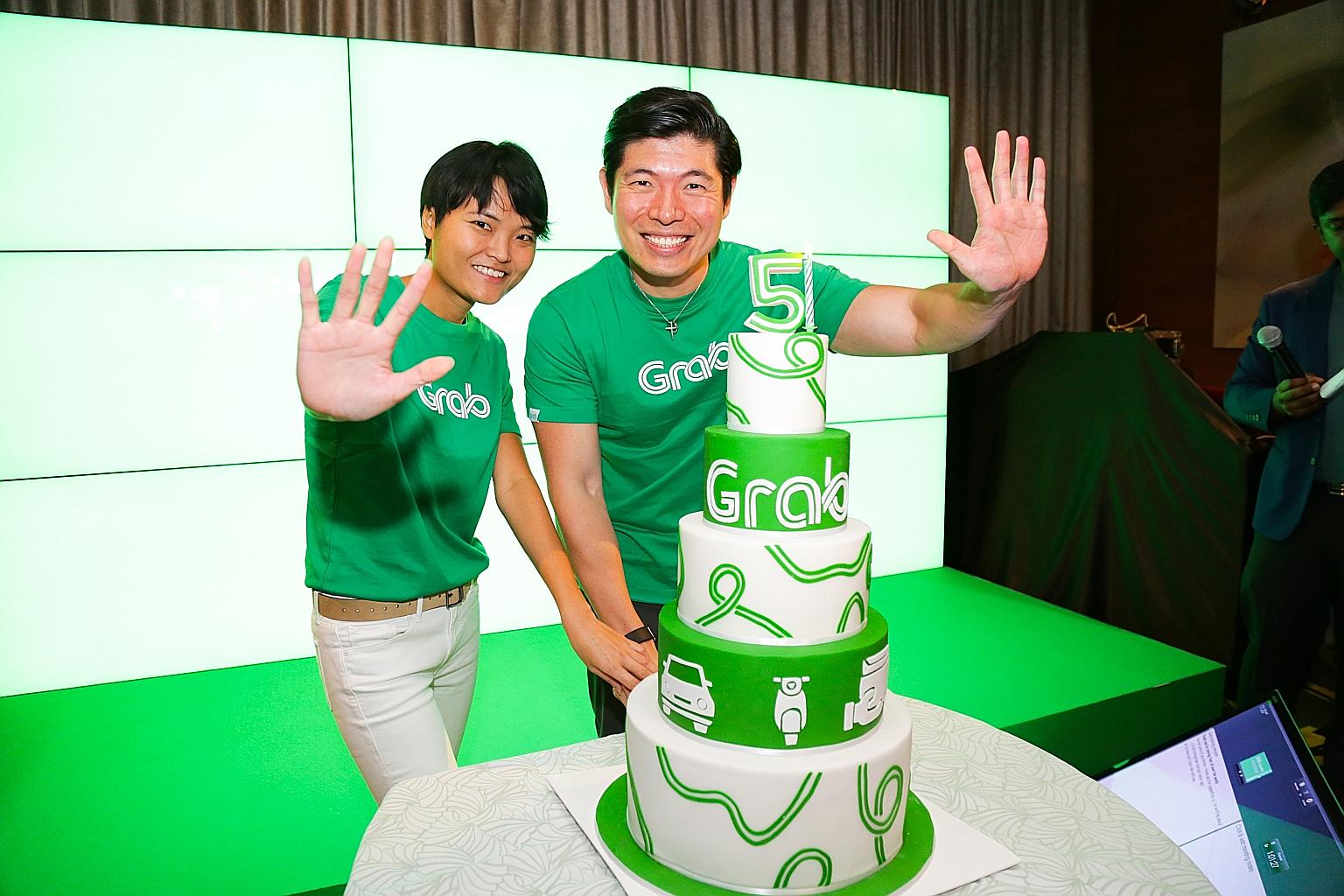 Grab co-founders Tan Hooi Ling (far left) and Anthony Tan at the company's fifth anniversary celebrations in 2017. The company put its name in the record books last week when it announced plans to list on American technology-heavy index Nasdaq throug