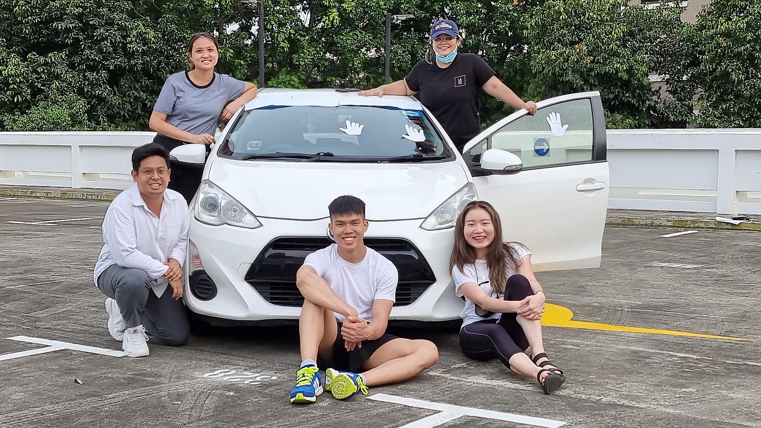 (Clockwise from front centre) Actor Benjamin Koh, artistic director Adeeb Fazah, producers Kristine Ng and Denise Dolendo, and playwright-actress Tiara Yap of The Second Breakfast Company. It is staging Search Engine, a production based on the Subaru