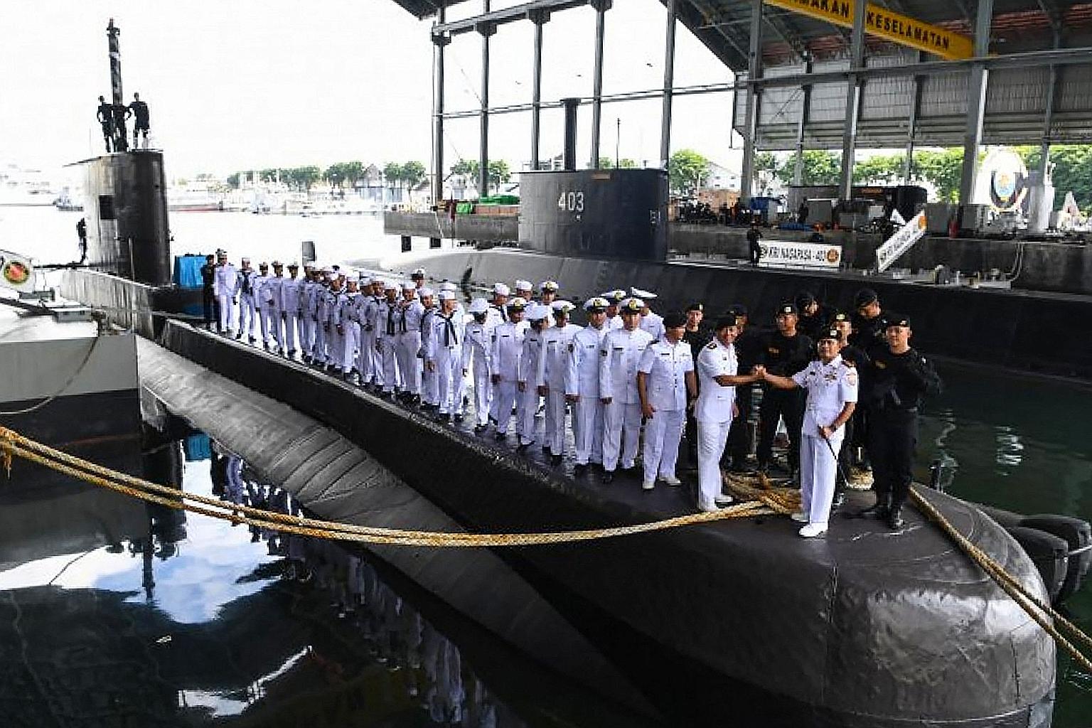 Crew and officers at a ceremony on board the KRI Nanggala-402 submarine in Surabaya in 2019, in a handout photo from the Indonesia military. PHOTO: AGENCE FRANCE-PRESSE