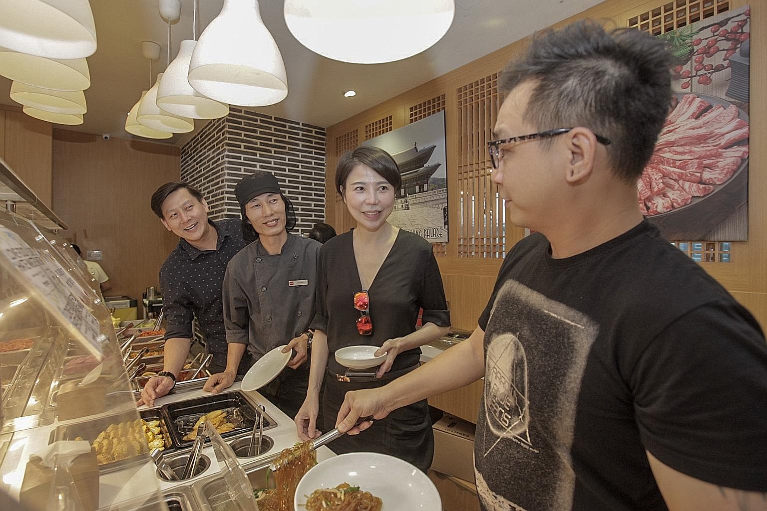 Ministry of Food founder Lena Sim at one of her restaurants in a 2019 file picture. In an interview with The Straits Times around March last year, she blamed the declining business on the coronavirus pandemic and a Mareva injunction freezing her asse