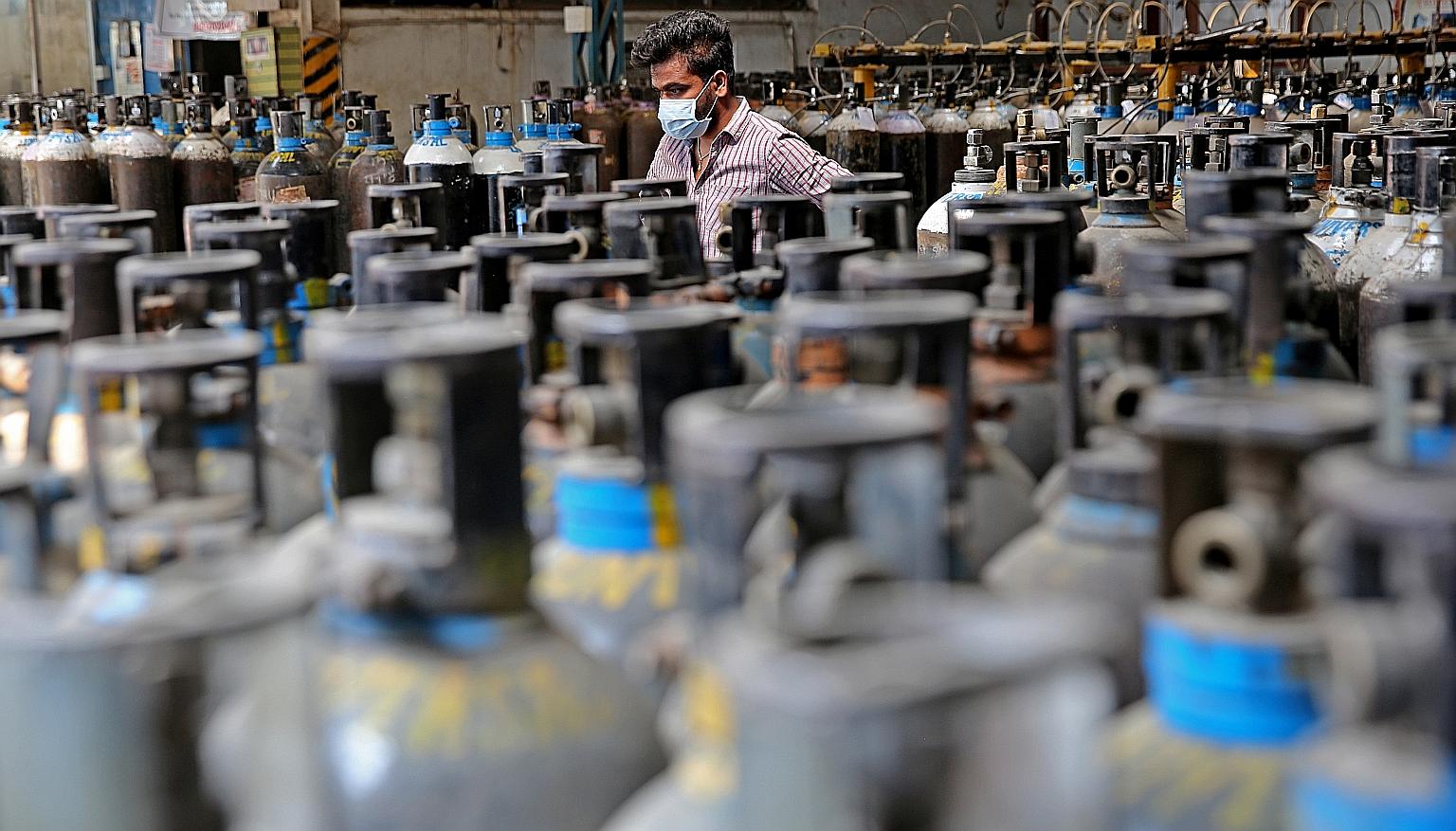 An oxygen filling centre in Bangalore, India. New Delhi's largest hospital chain operator rushed to court on Wednesday night to seek critical oxygen supply after 1,400 Covid-19 patients across the Indian capital were put at risk due to "dangerously l