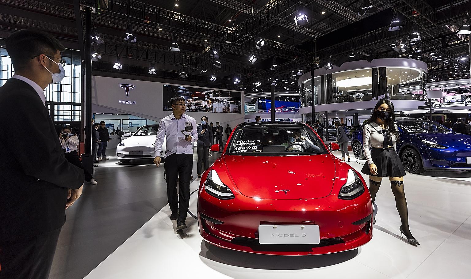 A Tesla Model 3 car at the Tesla trade fair stand during a media day of the Auto Shanghai motor show in Shanghai, China, on Monday.