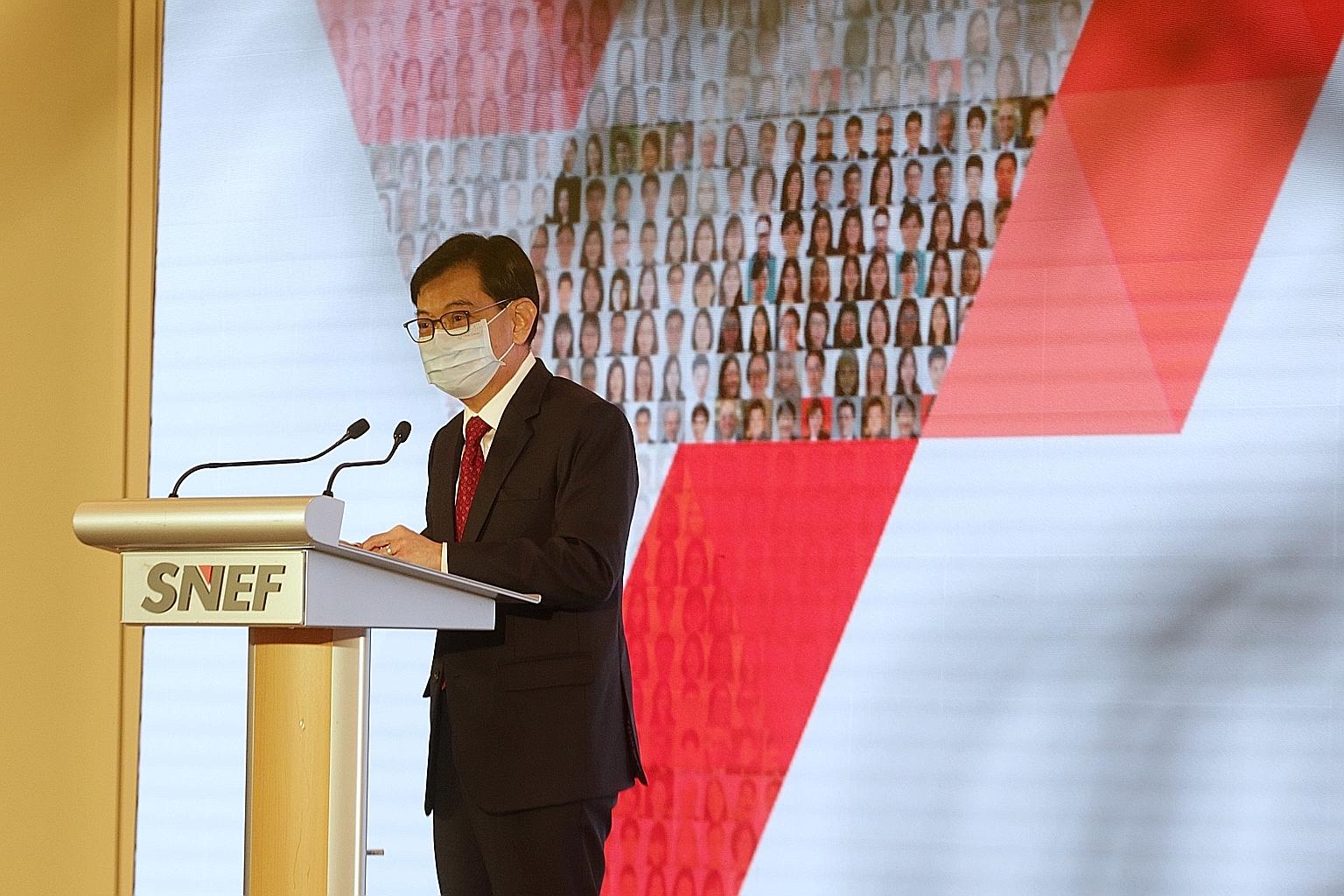 Deputy Prime Minister Heng Swee Keat delivering his speech at the Singapore National Employers Federation's event yesterday. ST PHOTO: TIMOTHY DAVID