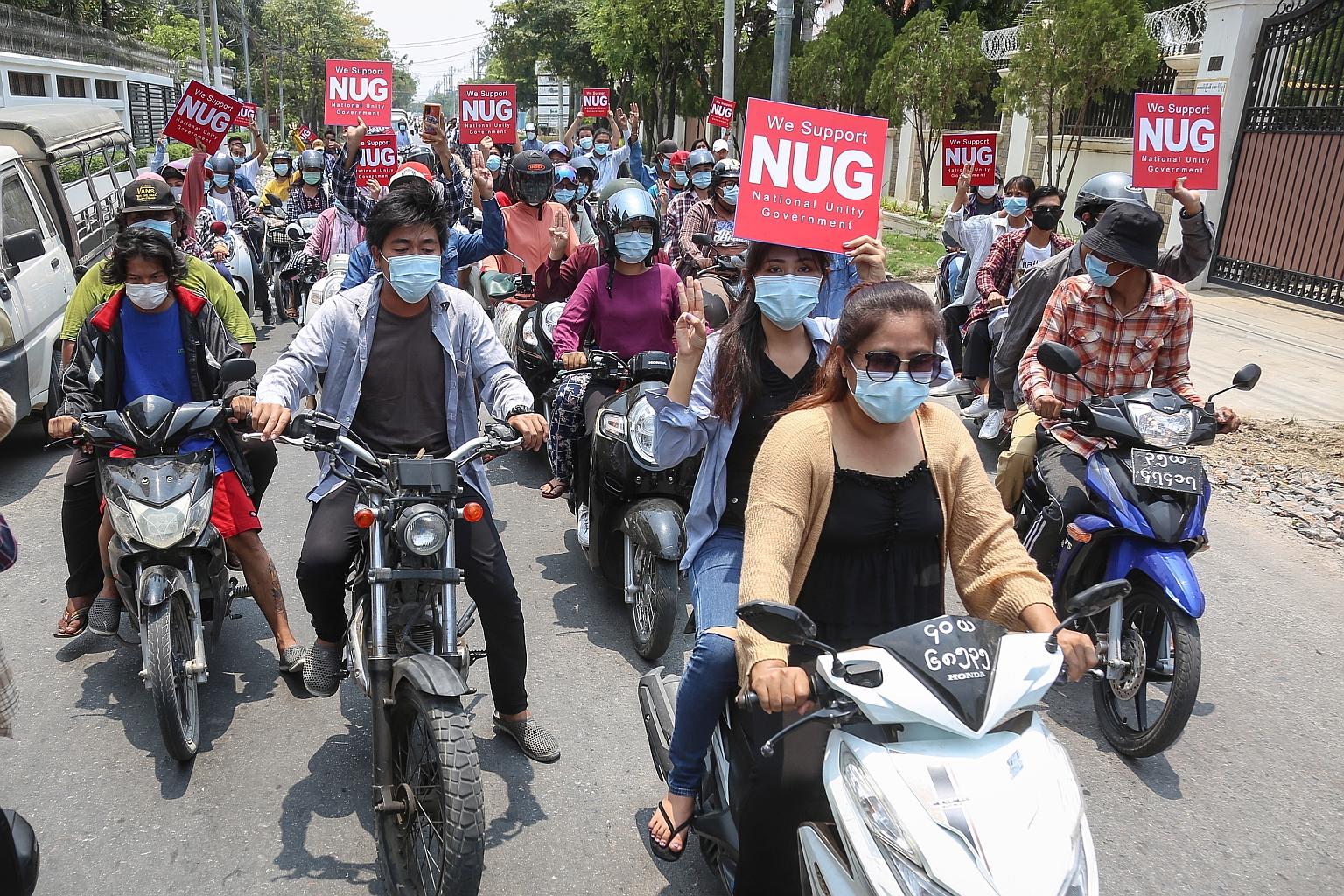 Demonstrators in Mandalay showing their support yesterday for Myanmar's shadow National Unity Government, a day after Asean met to discuss the turmoil in the country following the Feb 1 military coup. A protest organiser says that "whatever the outco