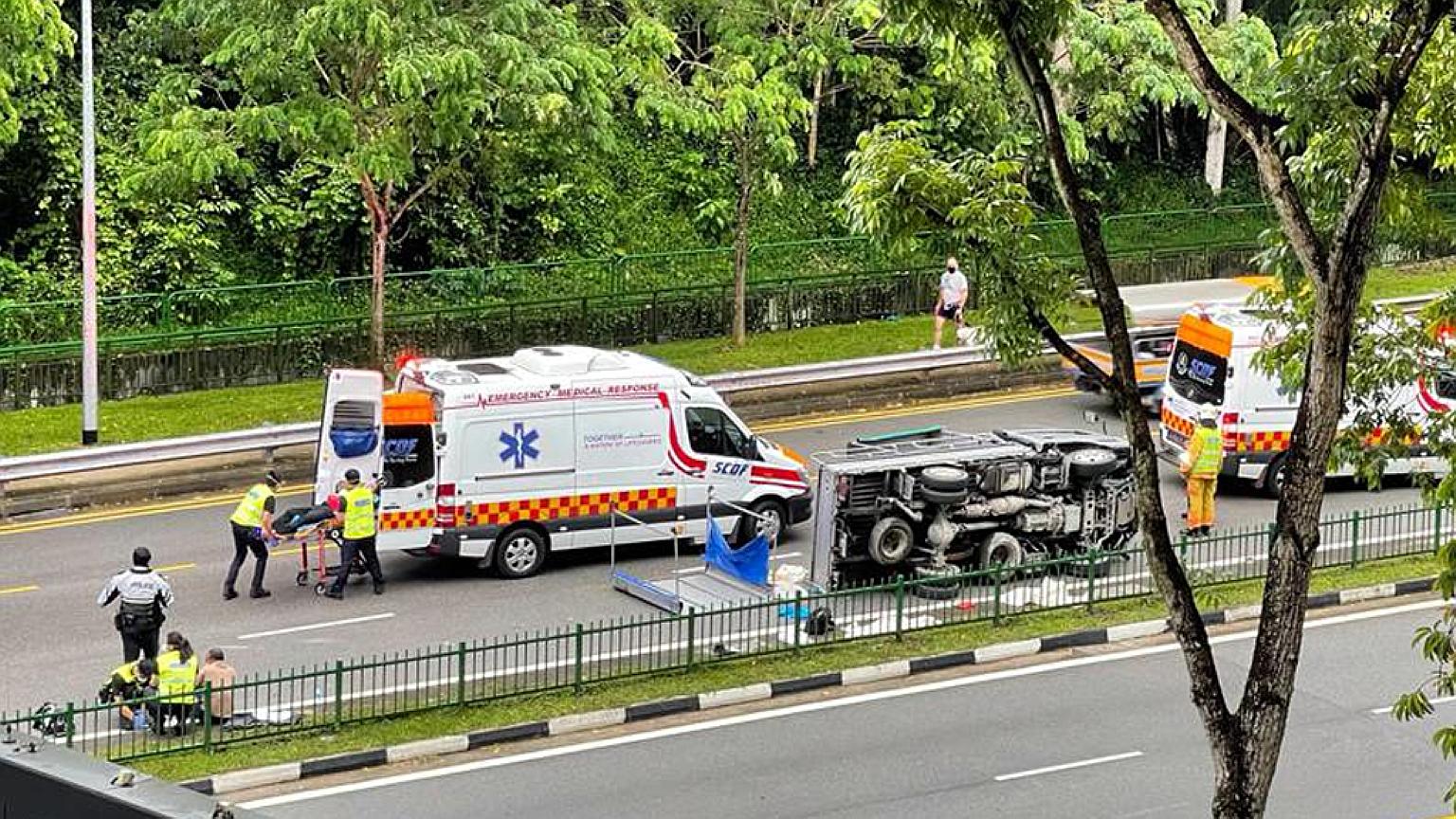 The driver and nine passengers in Saturday morning's lorry accident near The Rail Mall in Upper Bukit Timah Road, understood to be foreign workers, were aged between 26 and 50. PHOTO: LIANHE ZAOBAO
