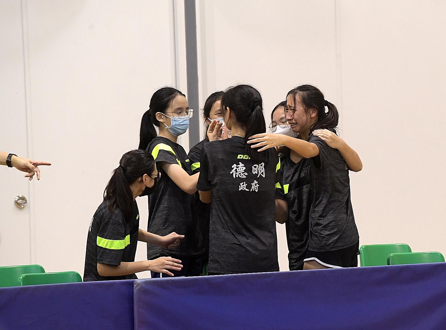An emotional celebration for Dunman High School paddlers after retaining their East Zone B Division girls' title yesterday.