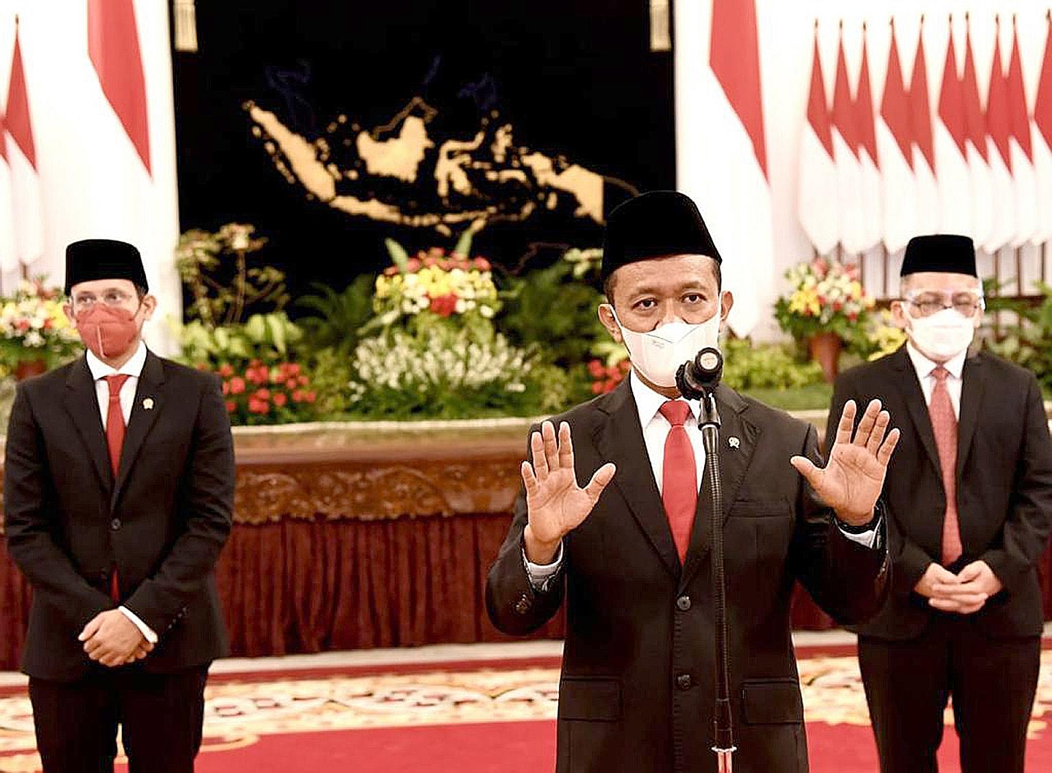 Newly appointed Investment Minister Bahlil Lahadalia (in foreground), flanked by new Minister for Education, Culture, Research and Technology Nadiem Makarim and Dr Laksana Tri Handoko (far right), the new chief of the National Research Agency. The th