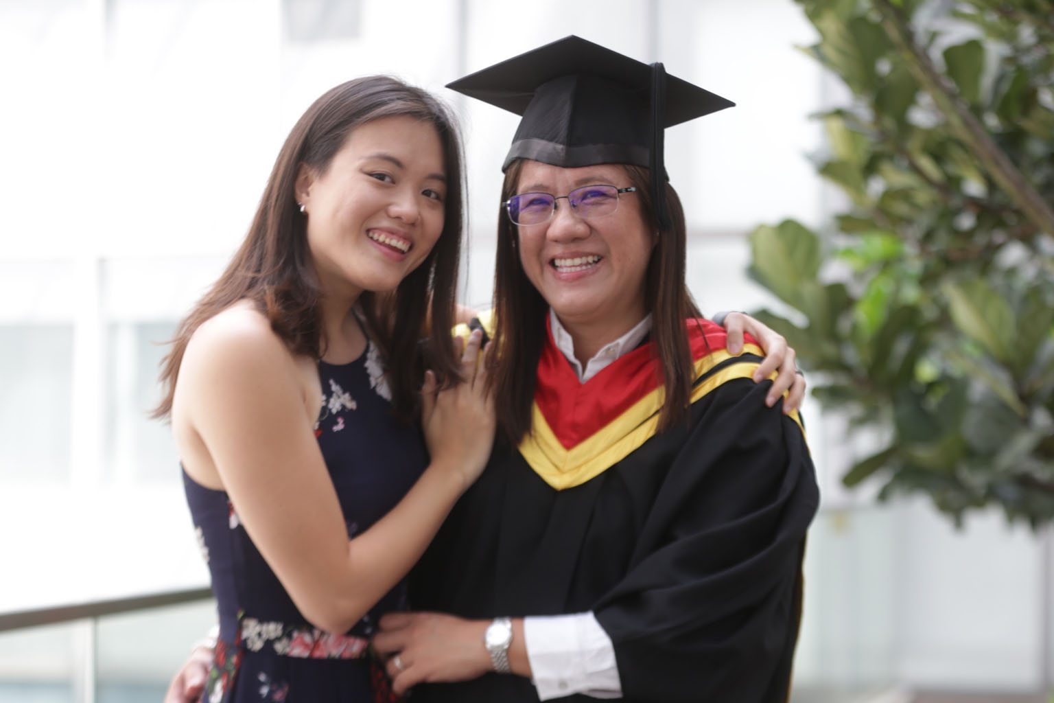 Ms Jenine Koh with her mother, Ms Jaslyn Teo, who received her Master of Early Childhood Education degree from Singapore University of Social Sciences yesterday. Ms Koh is expected to obtain her Bachelor of Early Childhood Education with Entrepreneur