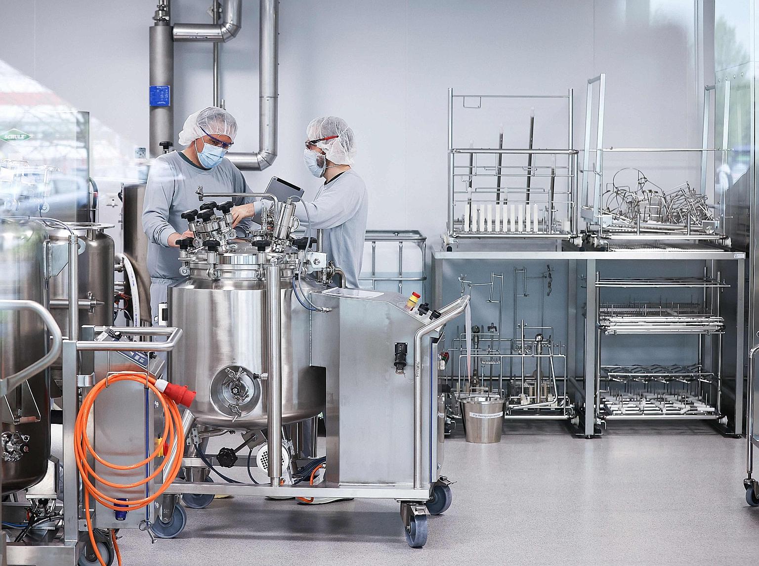 Staff working on the production of the Pfizer-BioNTech Covid-19 vaccine at a plant near Hamburg, Germany. The companies have submitted a request to the European Medicines Agency to expand the use of their vaccine to those aged 12 to 15 years.
