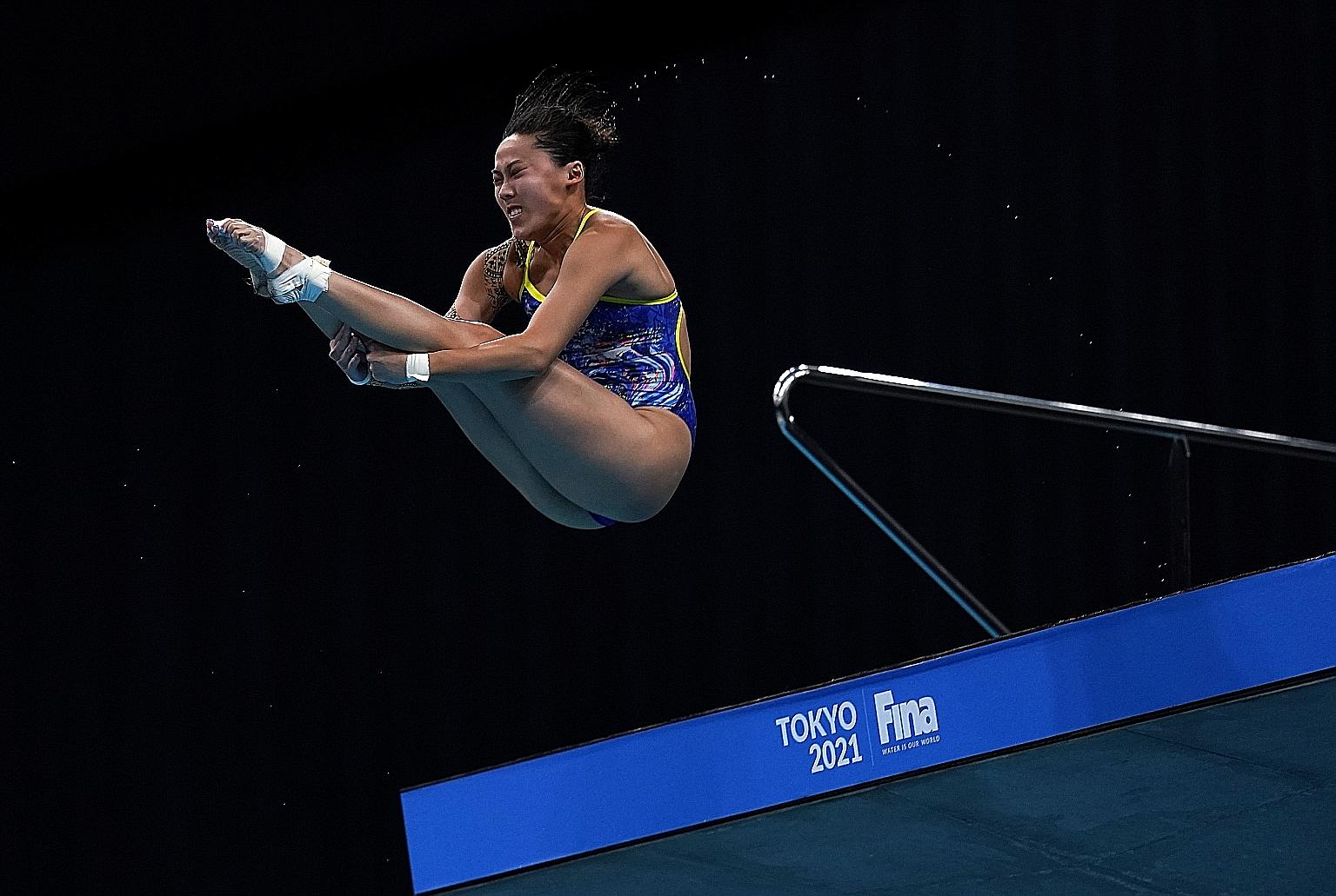 Singapore's Freida Lim on her way to finishing 15th in the field of 18 with a five-dive score of 272.35 in the women's 10m platform semi-final at the Fina Diving World Cup in Tokyo yesterday. Her result meant that she should have done enough to quali