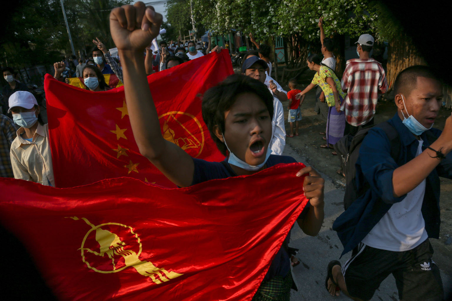 Demonstrators marching during an anti-military coup protest in Mandalay, Myanmar, yesterday. The National Unity Government, set up by opponents of army rule, said yesterday that it has formed a defence force to protect its supporters from military at