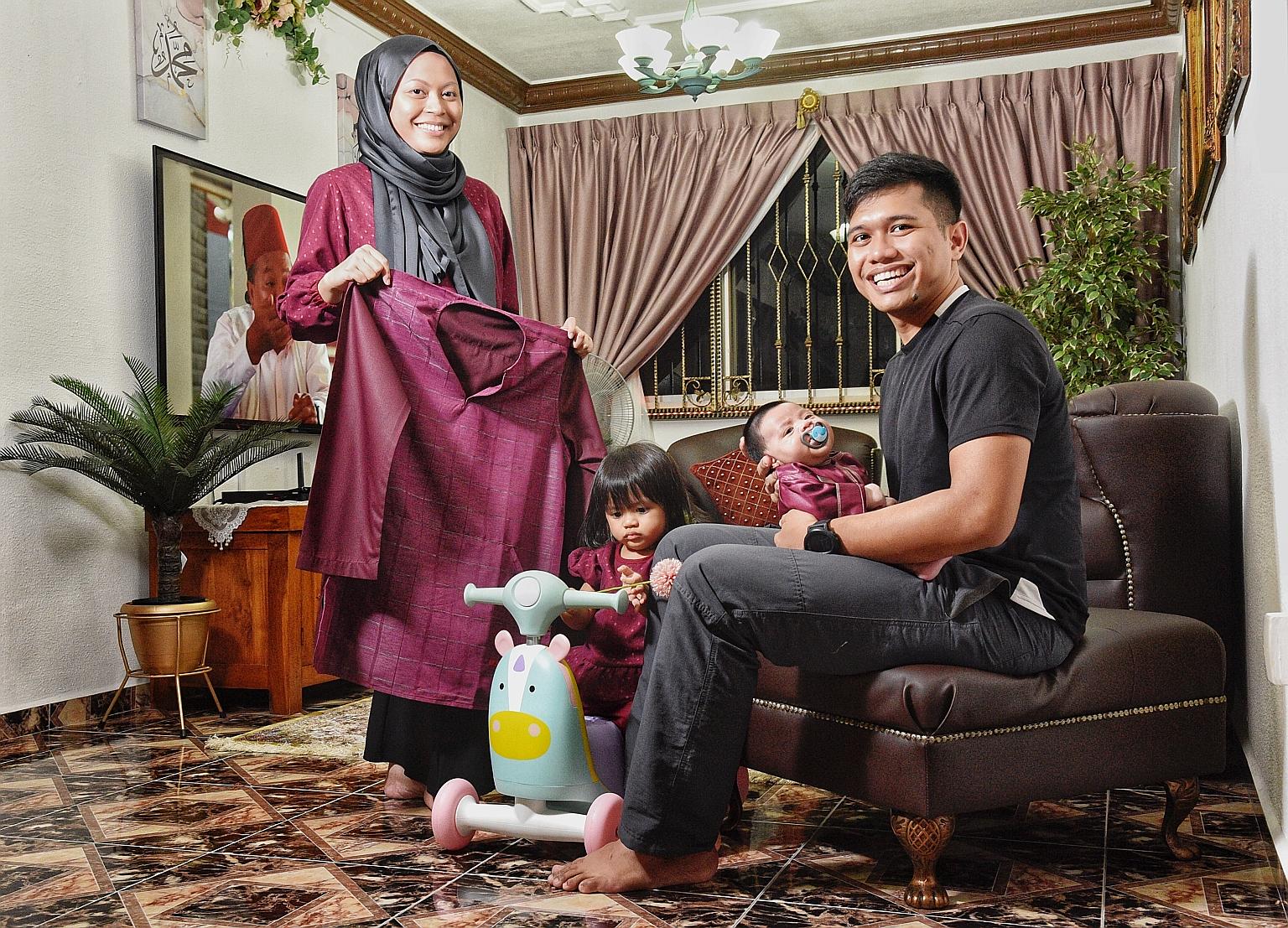 Paramedic Nur Farahdillah Abdullah - pictured with her husband Muhammad Nasir and their children, 22-month-old daughter Nurul El-Meera Anzalna, and one-month-old son Muhammad Al-Warith - is disappointed that stricter Covid-19 measures mean that she w