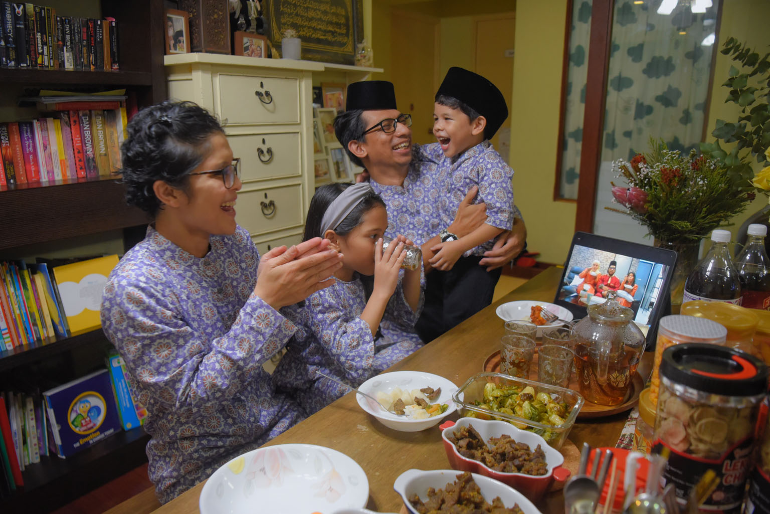Like many who are celebrating Hari Raya Aidilfitri, Madam Siti Zubaidah Isa and her family said there was a sense of the familiar yesterday when they put on their festive best to break fast on the final day of Ramadan with loved ones, amid tighter me