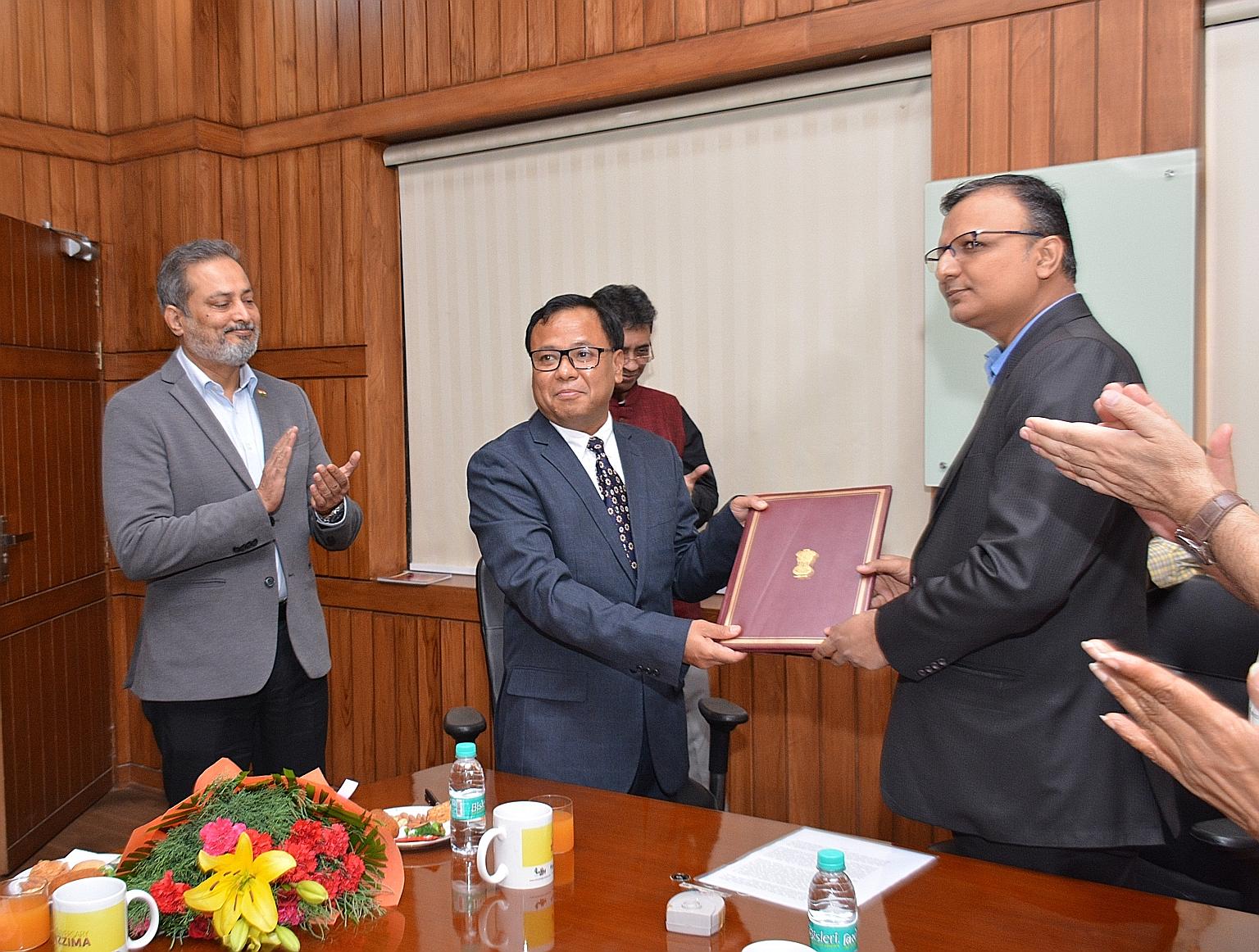 Mr Soe Myint (centre), editor-in-chief of Mizzima, at the signing of a deal with Indian public broadcasting agency Prasar Bharati in 2018. In 1990, he and a friend hijacked a flight from Bangkok to Yangon, diverting it to Kolkata to draw global atten