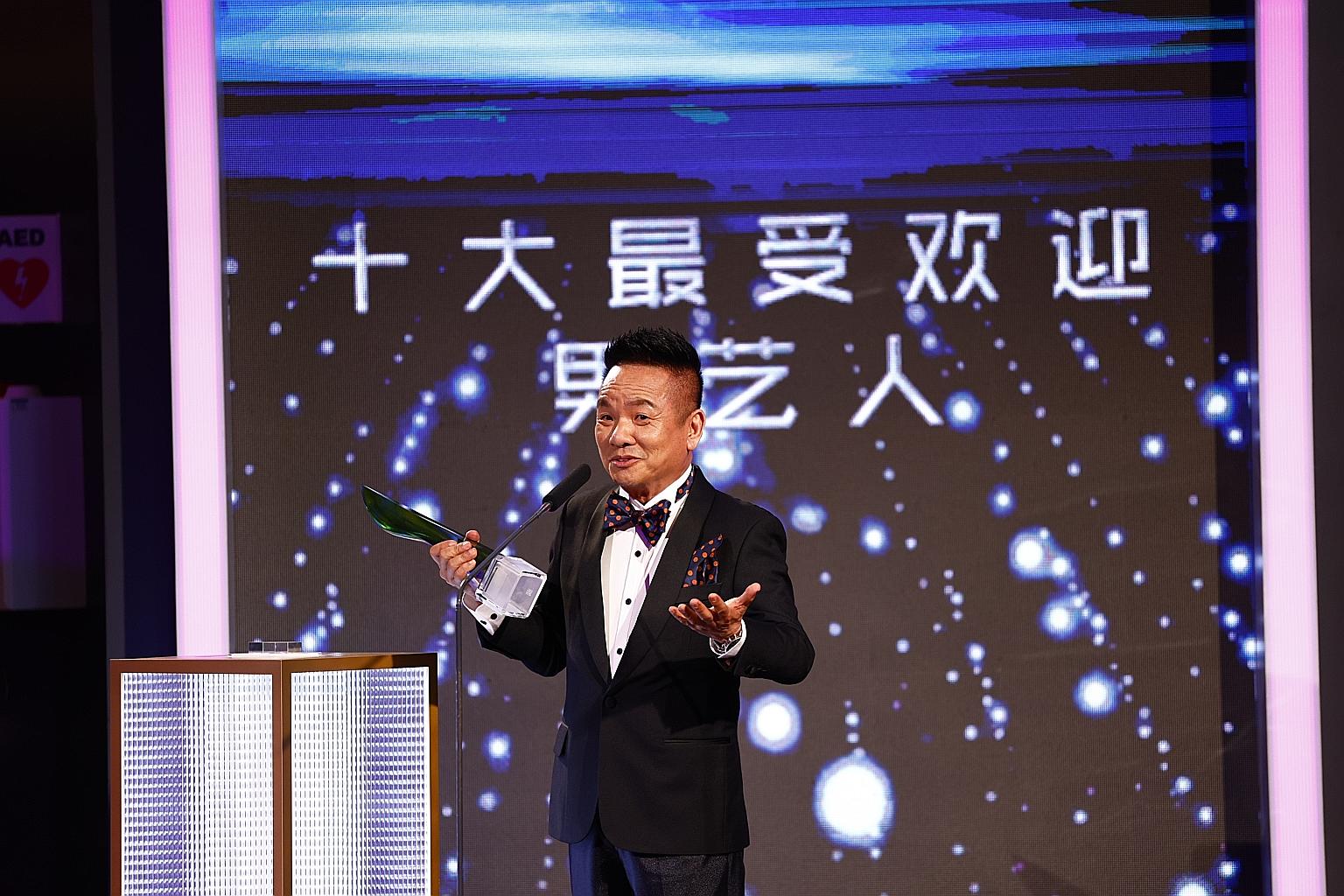 Artists prepare the wax figures of Britain's Prince Harry and Meghan, Duchess of Sussex, in their new position in Madame Tussauds in London.