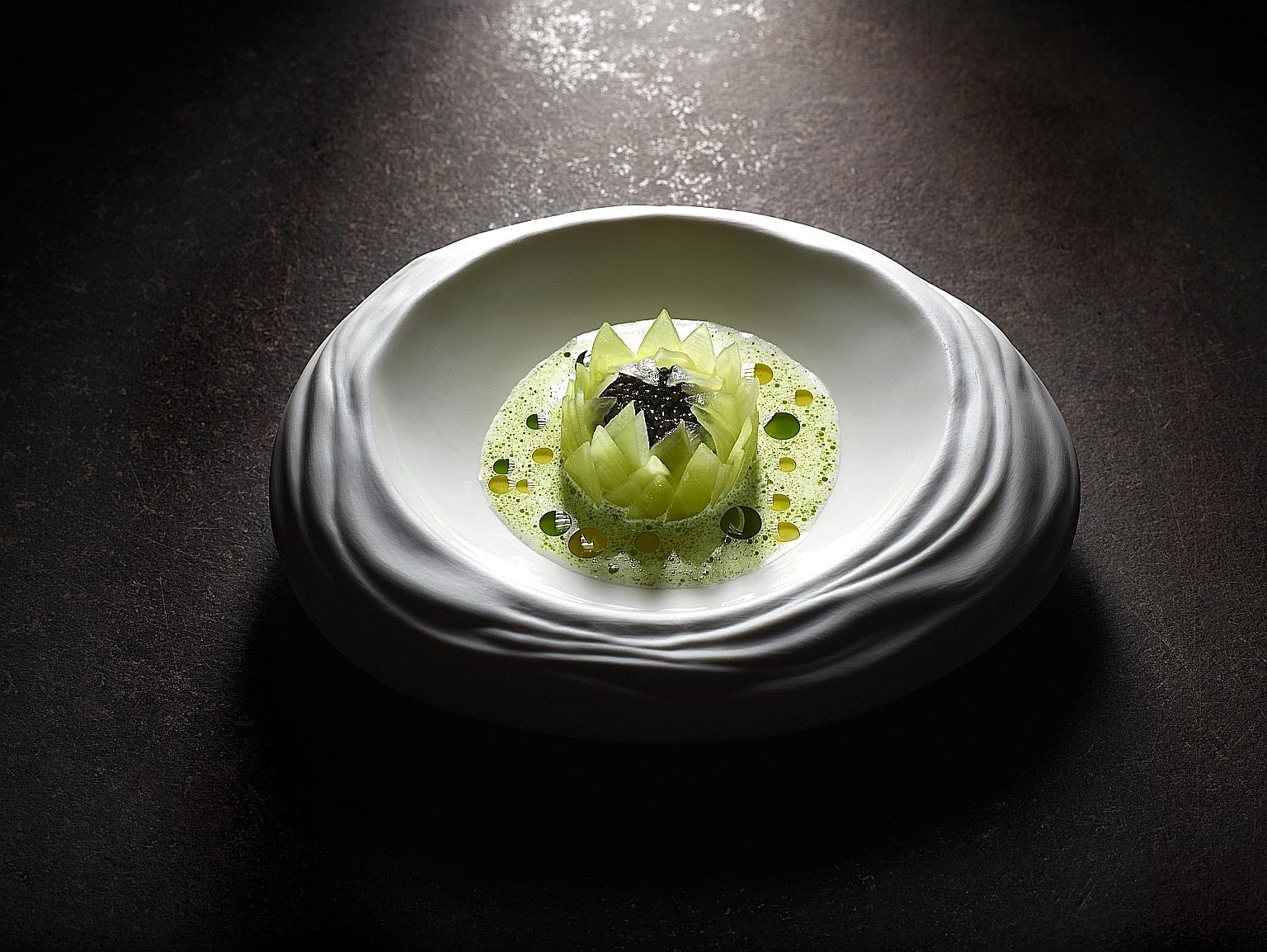 Lactuca Sativa with celtuce, caviar, stracciatella cheese - a dish from the Mirazur pop-up. Bookings affected by the latest Covid-19 restrictions will be reallocated to a later date.