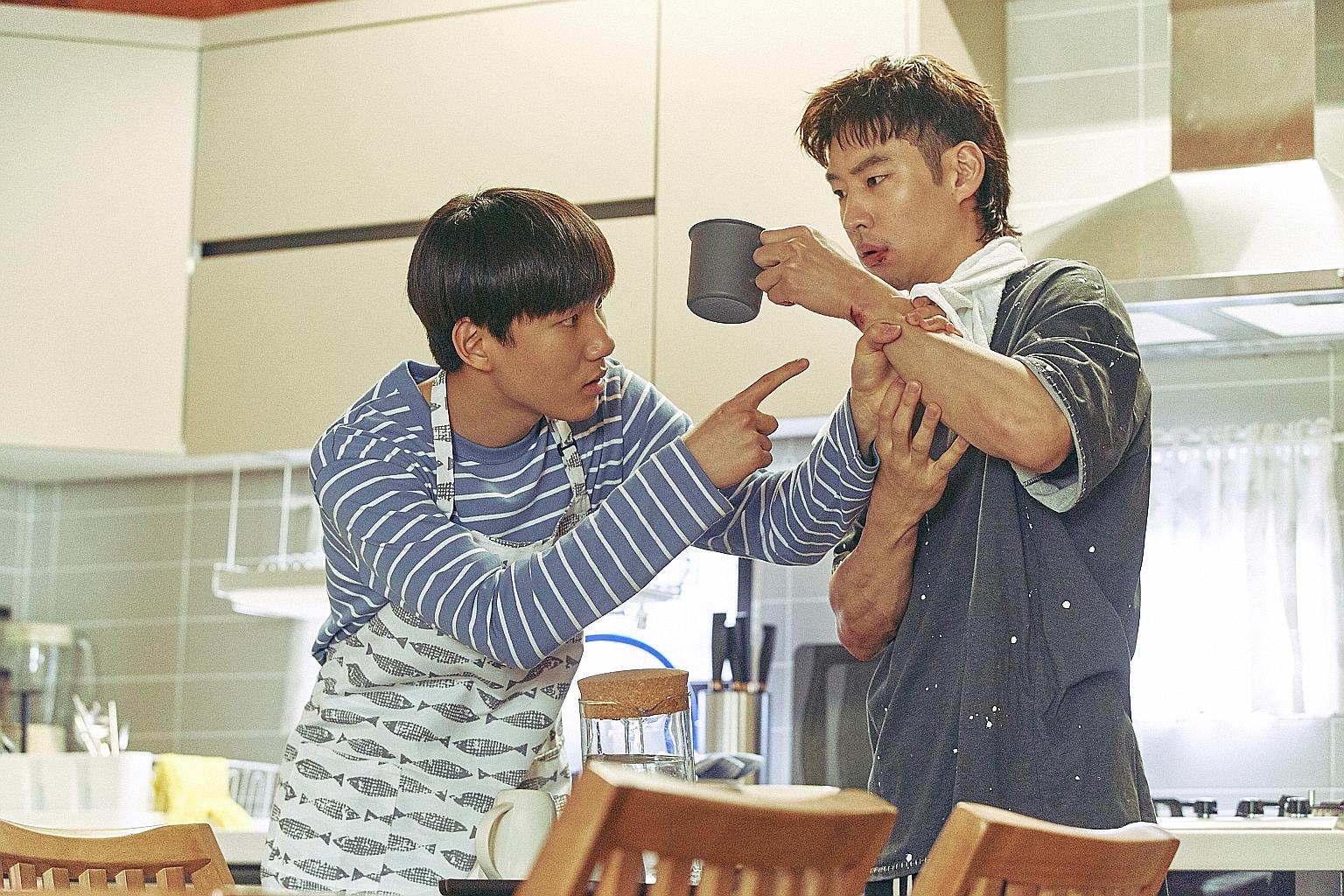 Tang Jun-sang (far left) and Lee Je-hoon (left) play estranged relatives who grow closer over the course of their work as trauma cleaners, tidying up what the dead left behind.