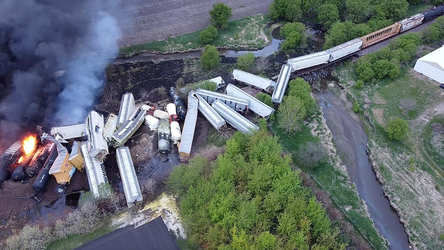 Fire seen on a Union Pacific train carrying hazardous material that derailed in Sibley in the US state of Iowa on Sunday. The derailment involved 47 rail cars, and led to the evacuation of about 80 people within an 8km radius around the scene. There 