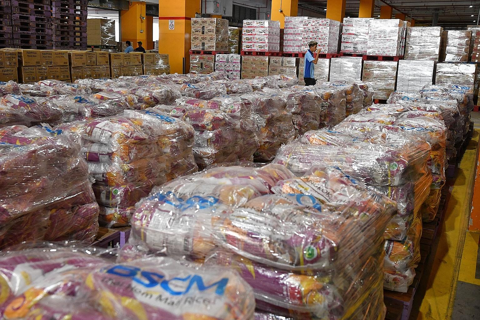 Food items at FairPrice's Benoi Distribution Centre. Even with stockpiling, Singapore remains vulnerable to the rising global demand for food.