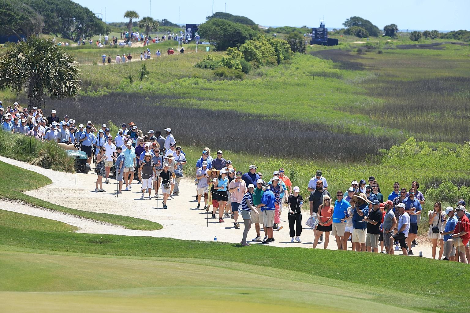 Fans taking in Monday's practice round ahead of the PGA Championship at Kiawah Island Resort in South Carolina. PHOTO: AGENCE FRANCE-PRESSE