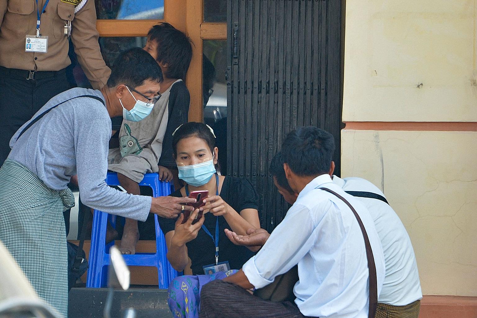 People outside an Internet shop in Naypyidaw in March. The authorities in Myanmar ordered telecom companies to restrict services on their mobile data networks following the Feb 1 military coup. PHOTO: AGENCE FRANCE-PRESSE
