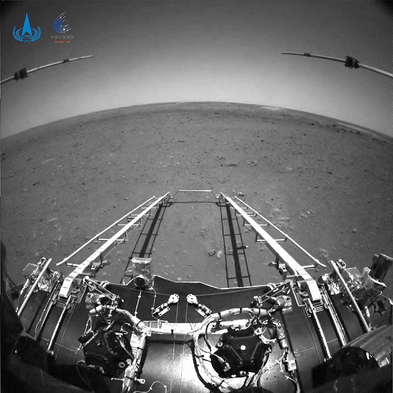 An image taken by a camera installed in front of China's Zhurong rover, showing a ramp on the lander that has been extended to the surface of the planet. PHOTO: EPA-EFE