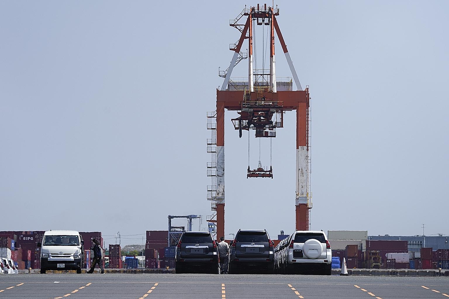 Toyota cars bound for shipment at a port in Yokohama earlier this month. Japan's exports to the United States grew 45.1 per cent in the year to April, on the back of demand for automobiles, car parts and ship engines.