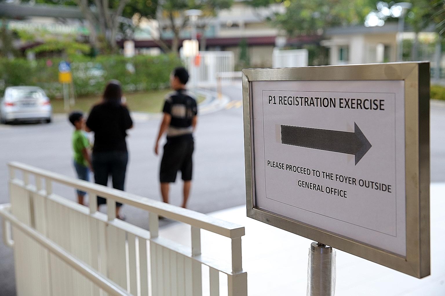 A Primary 1 registration exercise at Guangyang Primary School in 2015. As both the online application form and Primary 1-IS registration require the Singpass, parents should set up their Singpass 2-step verification early and ensure that their Singpa