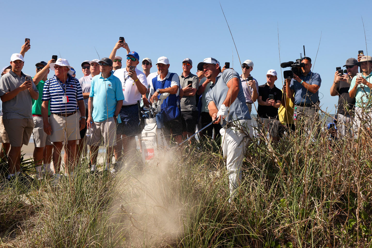 Brooks Koepka blasting out from the sand on the 15th hole, where he made bogey, during the first round of the PGA Championship at Kiawah Island on Thursday. The American carded six birdies for a three-under 69 which put him two shots behind Canadian 