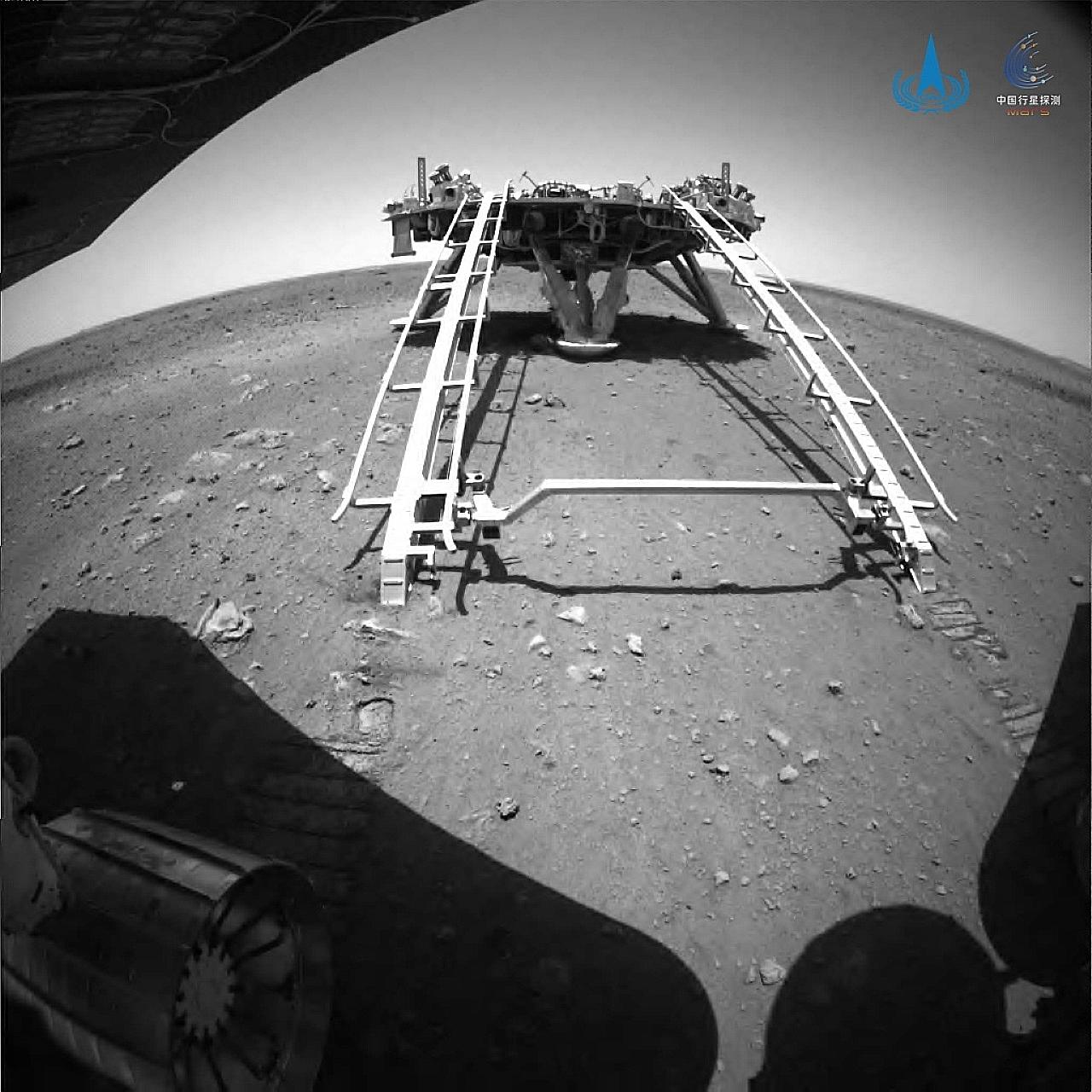 China's Zhurong Mars rover of the Tianwen-1 mission driving down from its landing platform onto the surface of Mars earlier this month.