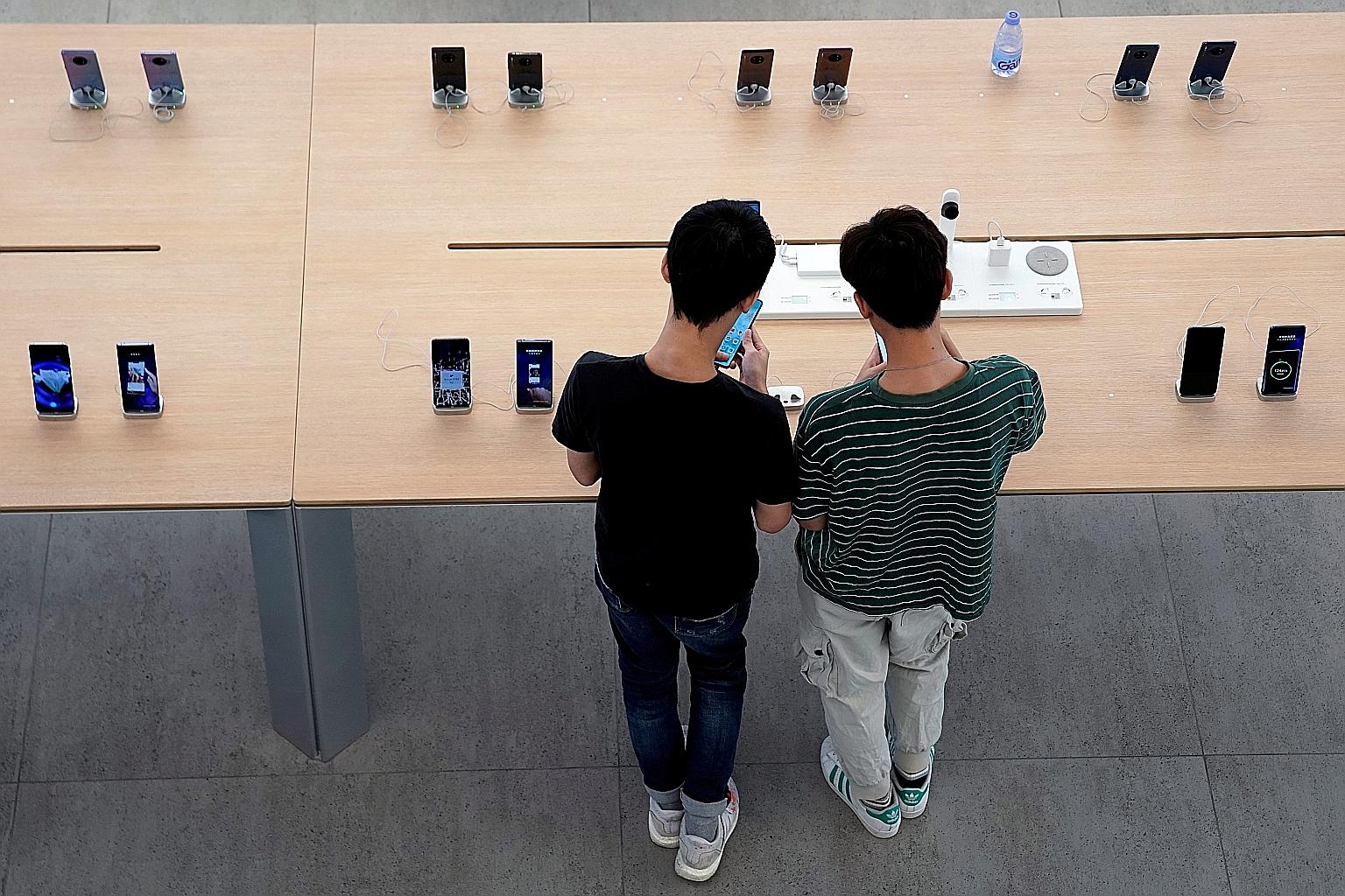 Huawei's first global flagship store in Shenzhen, in Guangdong province. Sales of Huawei's smartphones suffered after the Trump administration banned Huawei and dozens of its affiliates from buying American parts and technologies. This resulted in us