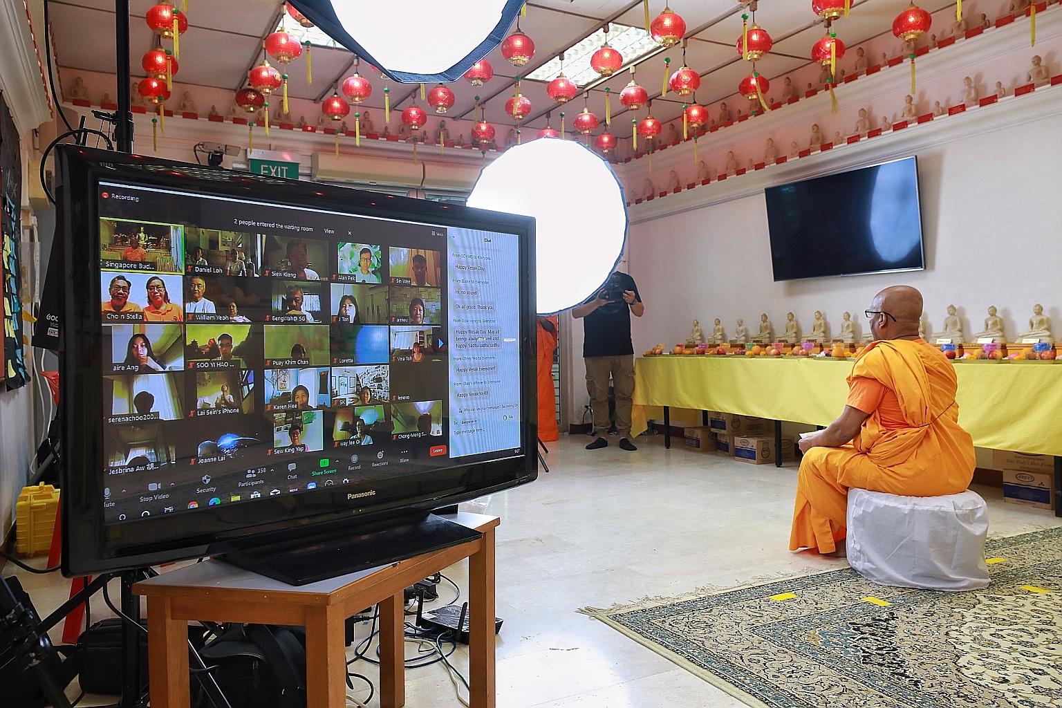 Venerable K. Dhammika Maha Thera, chief monk of the Singapore Buddhist Mission, addressing devotees taking part in the mass online meditation session to mark Vesak Day yesterday. The event included an online concert featuring more than 10 Buddhist mu