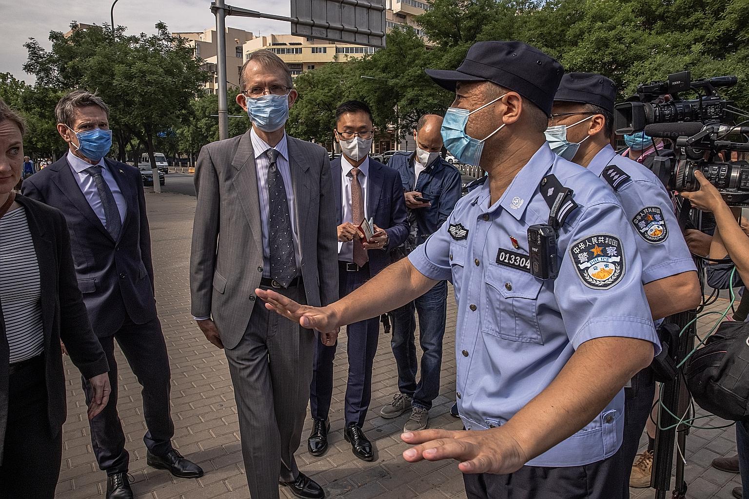 Australia's Ambassador to China Graham Fletcher (centre) was denied entry yesterday to the Beijing No. 2 Intermediate People's Court, where an espionage case against Australian blogger Yang Hengjun was being heard.