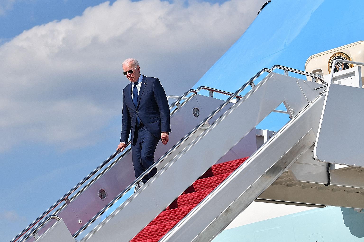 US President Joe Biden arriving at Andrews Air Force Base in Maryland on Thursday. He will propose a budget to fund large new investments such as in education, transportation and fighting climate change.