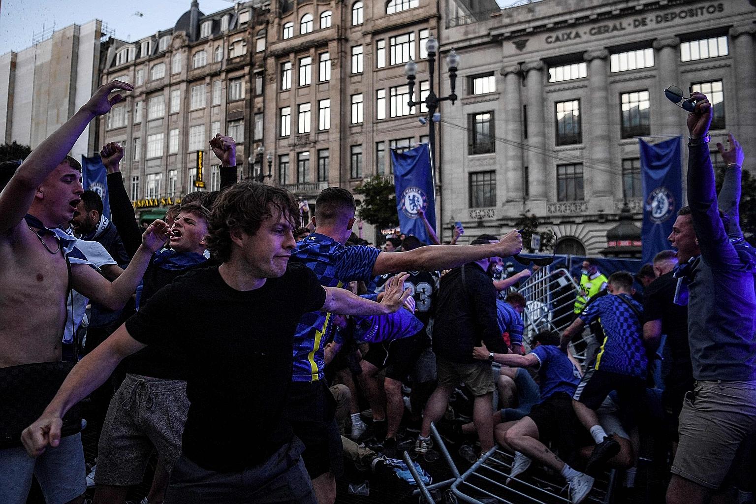 Many English fans, like these overjoyed Blues supporters, were mask-less and failed to observe social distancing rules while in Porto.