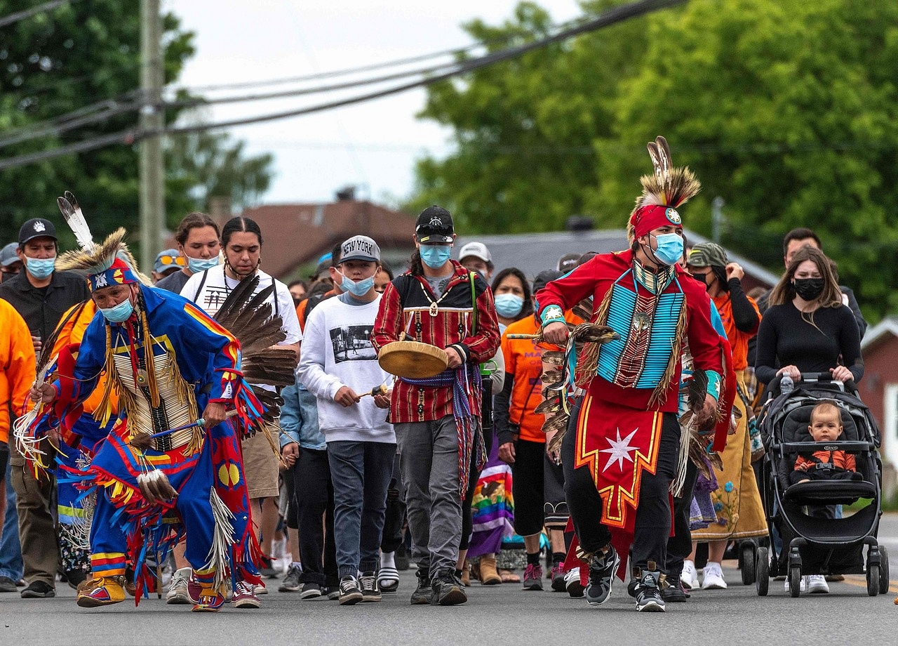 Canada mourns 215 children after remains found at indigenous school ...