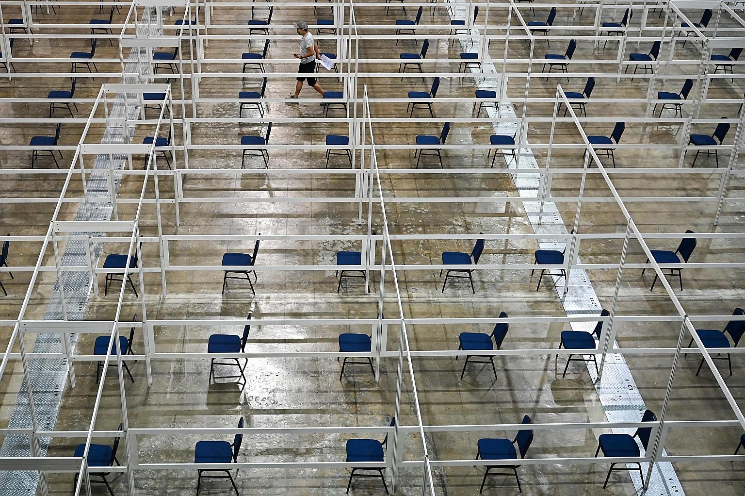 A Covid-19 vaccination centre in Kuala Lumpur. Malaysia had an average Covid-19 test positivity rate of 6.89 per cent in the past week, higher than the WHO threshold, indicating more testing should be done.