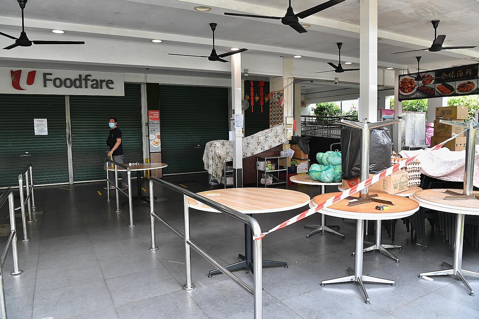 The NTUC Foodfare foodcourt at Block 308 Anchorvale Road, the location of a new Covid-19 cluster which now has nine cases, will be closed until June 13. ST PHOTO: CHONG JUN LIANG